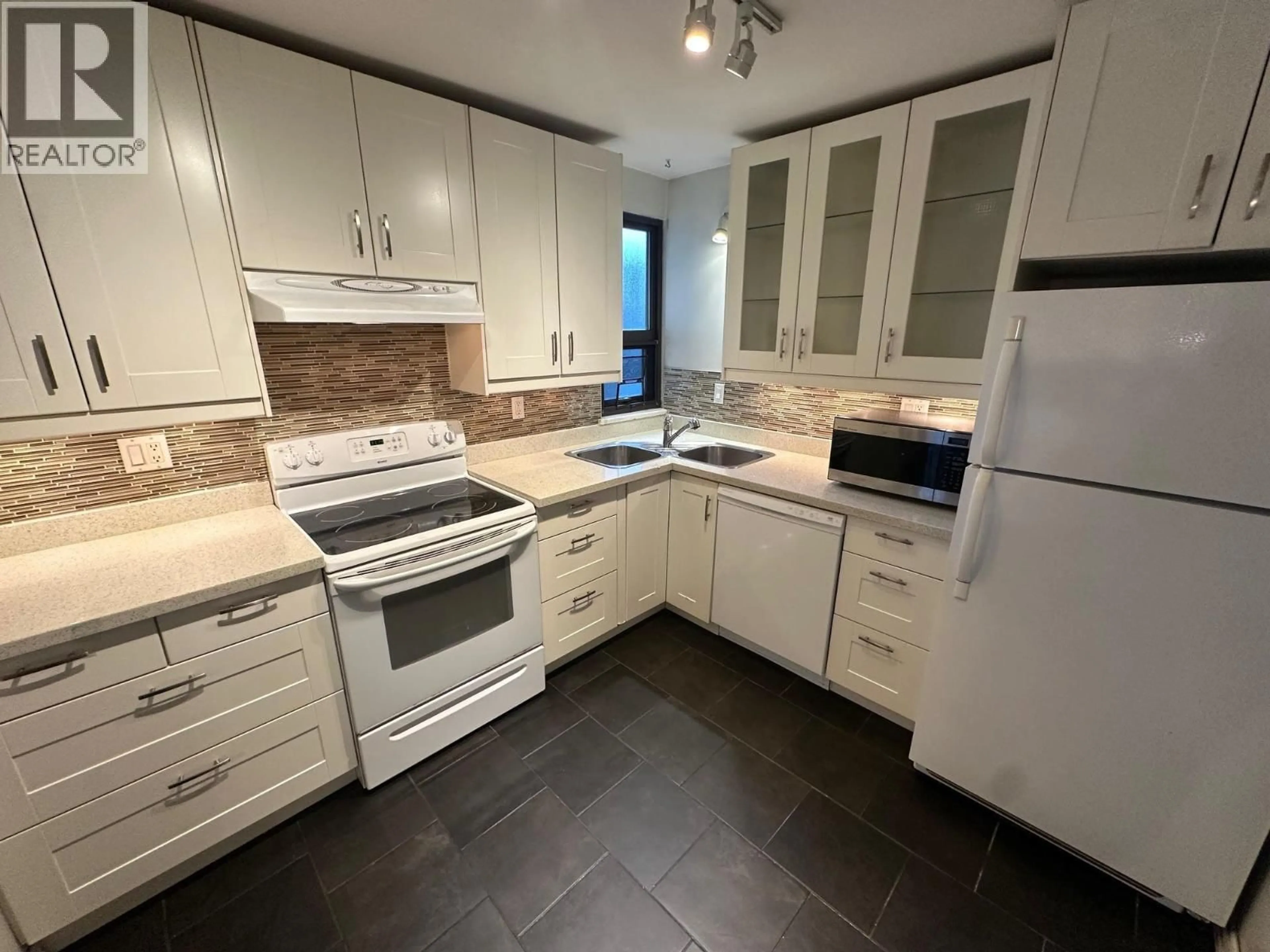 Standard kitchen, ceramic/tile floor for 102 - 9143 SATURNA DRIVE, Burnaby British Columbia V3J7K1