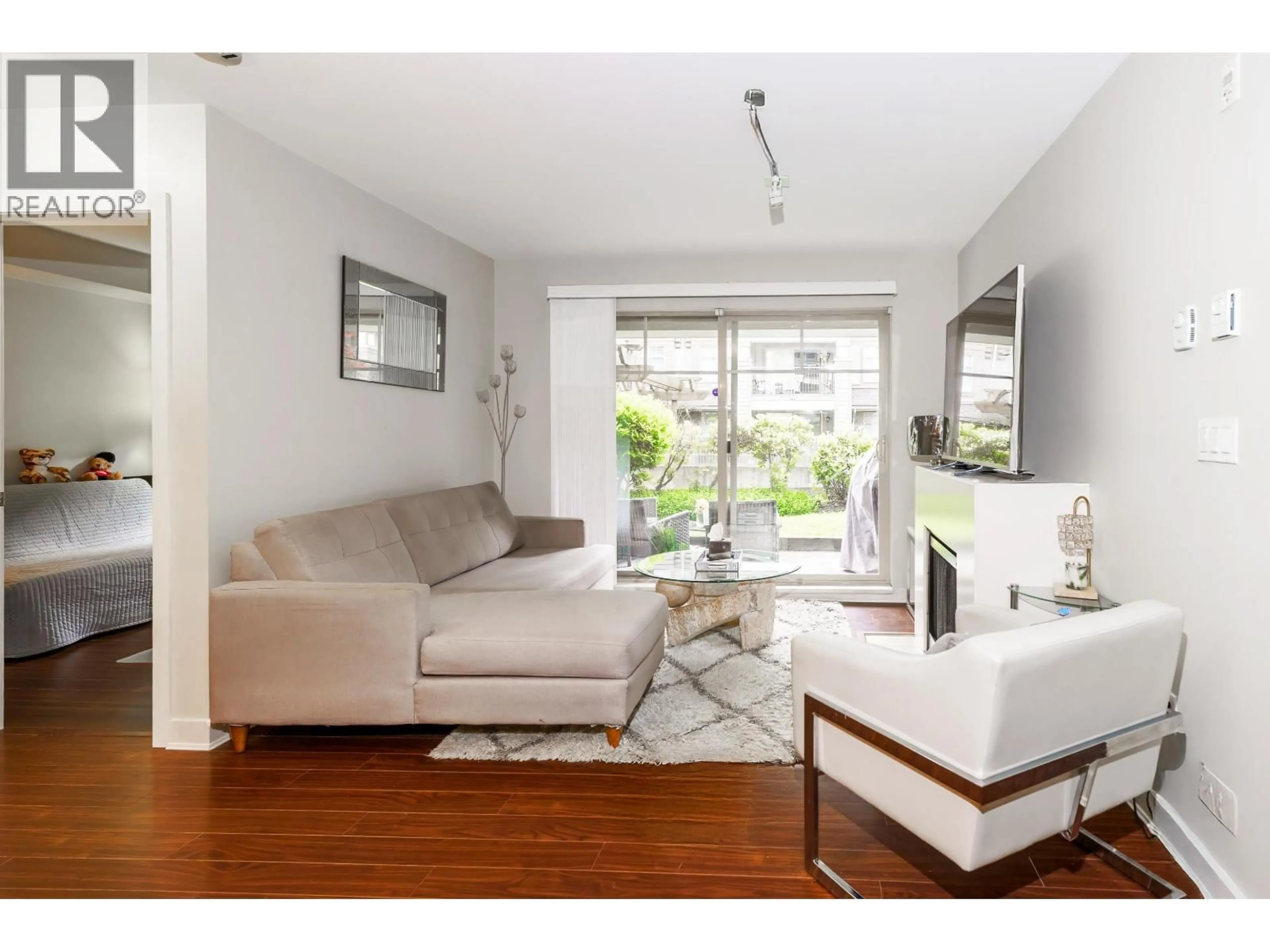 Living room with furniture, wood/laminate floor for 120 - 12238 224 STREET, Maple Ridge British Columbia V2X8W5