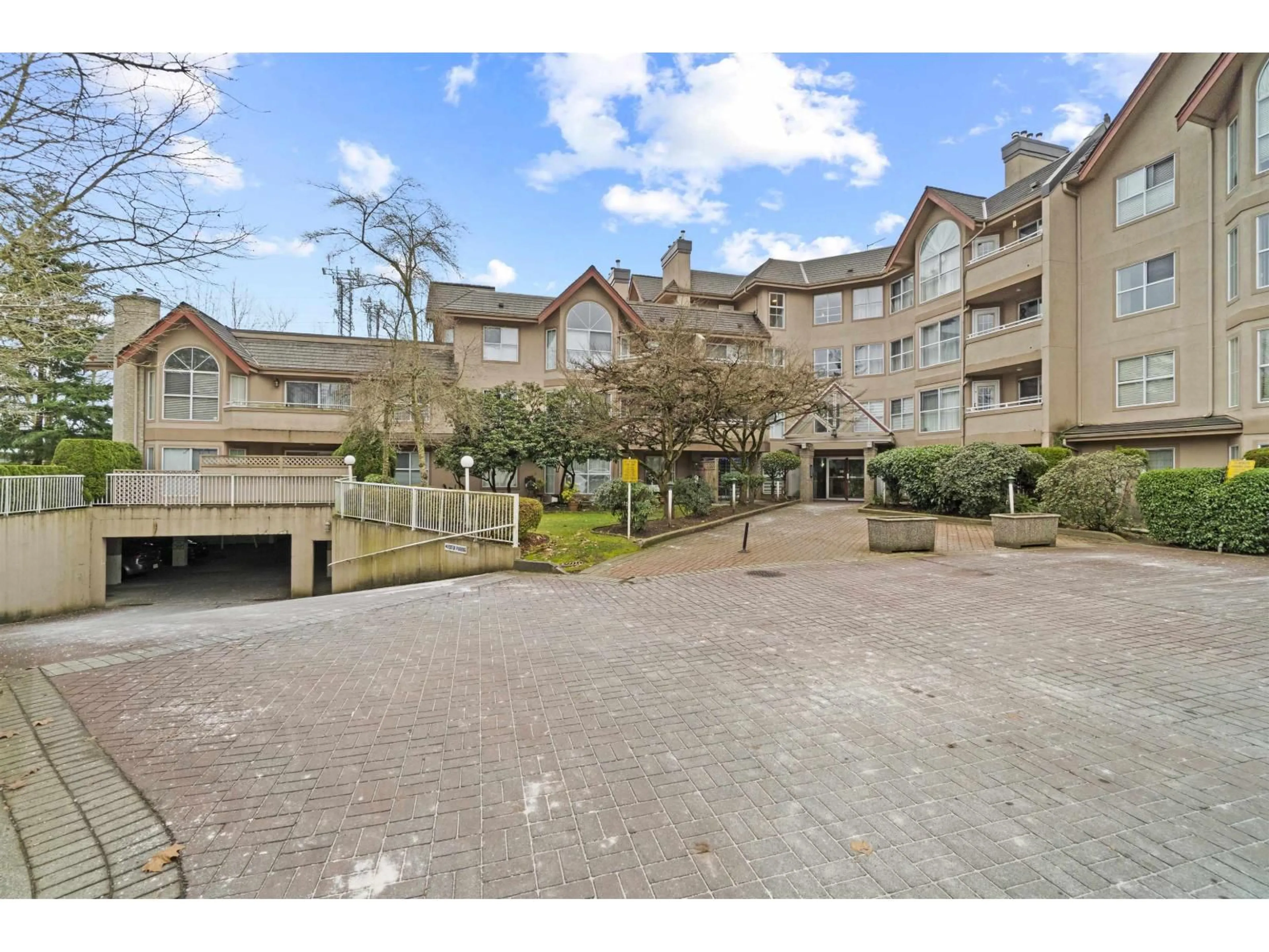 A pic from outside/outdoor area/front of a property/back of a property/a pic from drone, street for 103 - 7435 121A STREET, Surrey British Columbia V3W0W8