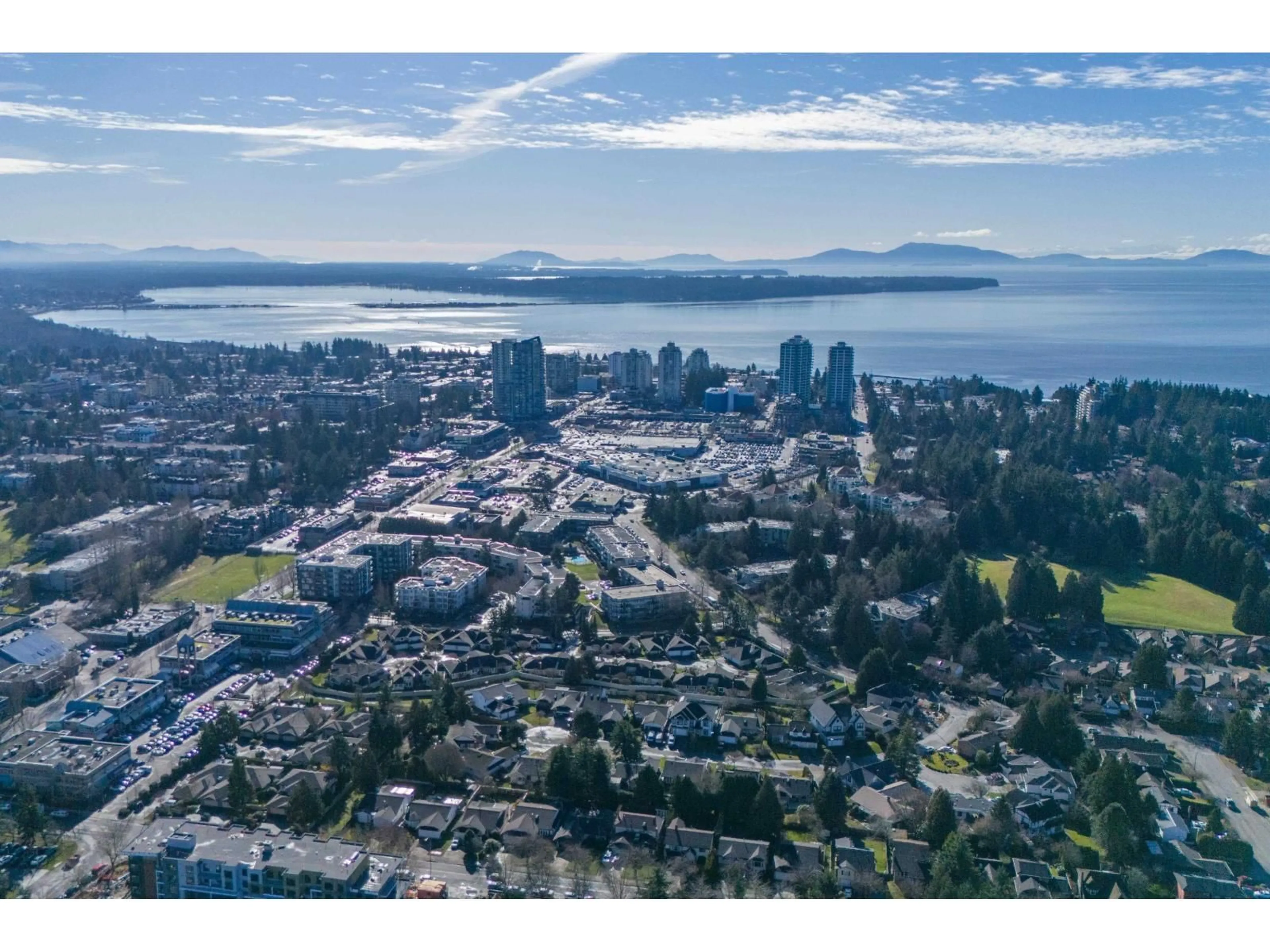 A pic from outside/outdoor area/front of a property/back of a property/a pic from drone, water/lake/river/ocean view for 101 - 15121 19 AVENUE, Surrey British Columbia V4A8J3