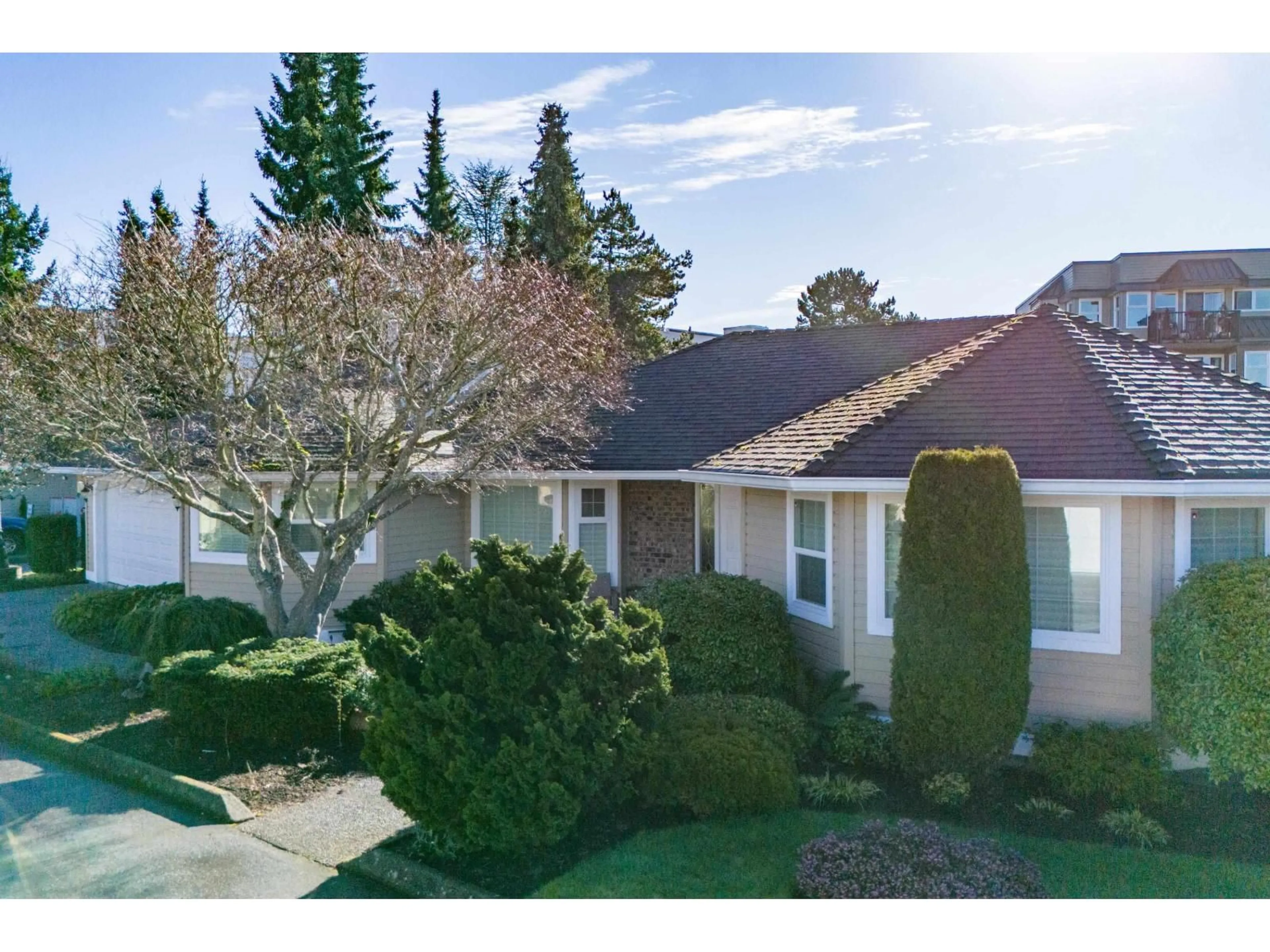 A pic from outside/outdoor area/front of a property/back of a property/a pic from drone, street for 101 - 15121 19 AVENUE, Surrey British Columbia V4A8J3