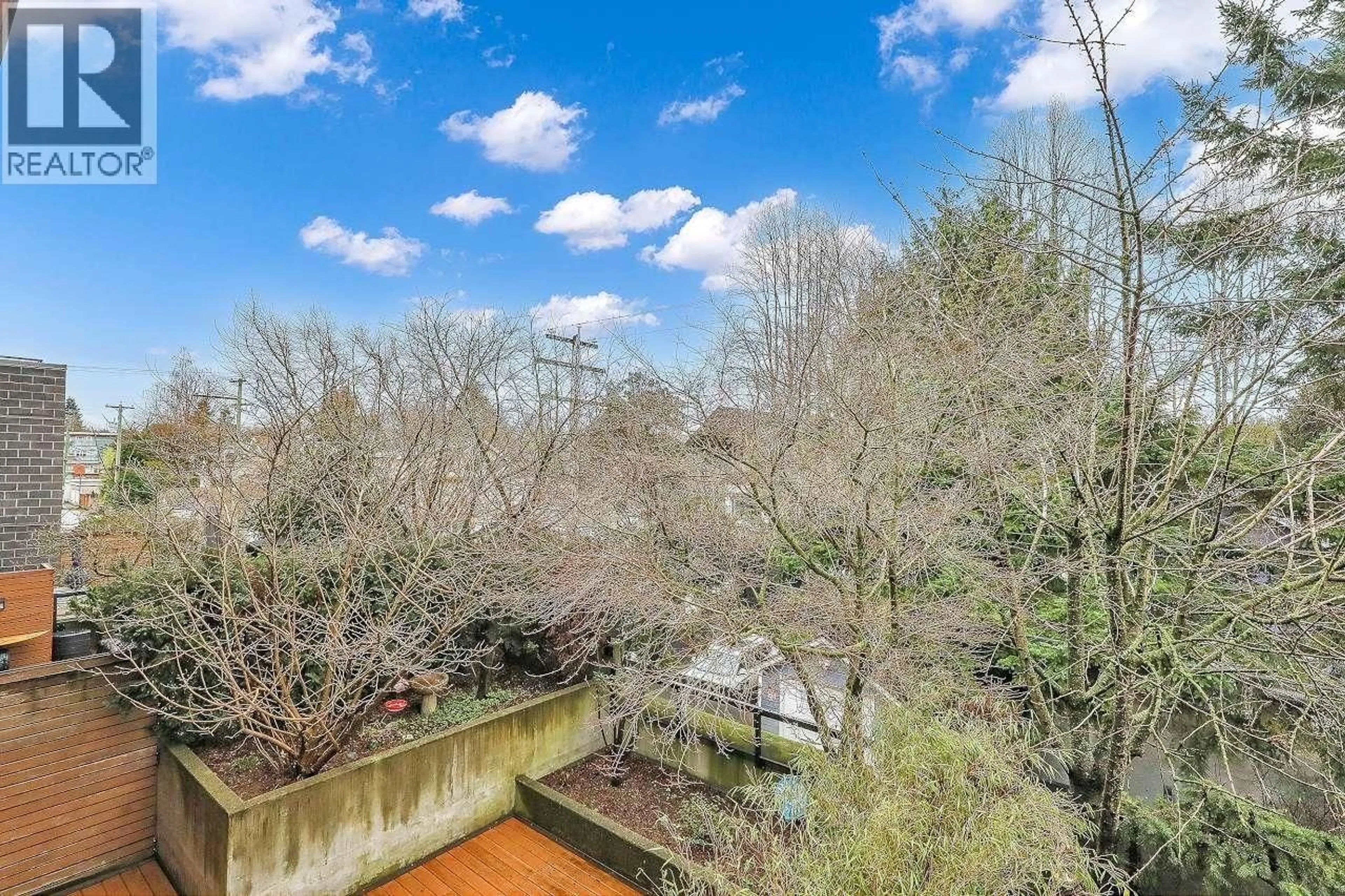 A pic from outside/outdoor area/front of a property/back of a property/a pic from drone, water/lake/river/ocean view for 303 - 2525 BLENHEIM STREET, Vancouver British Columbia V6K4W6