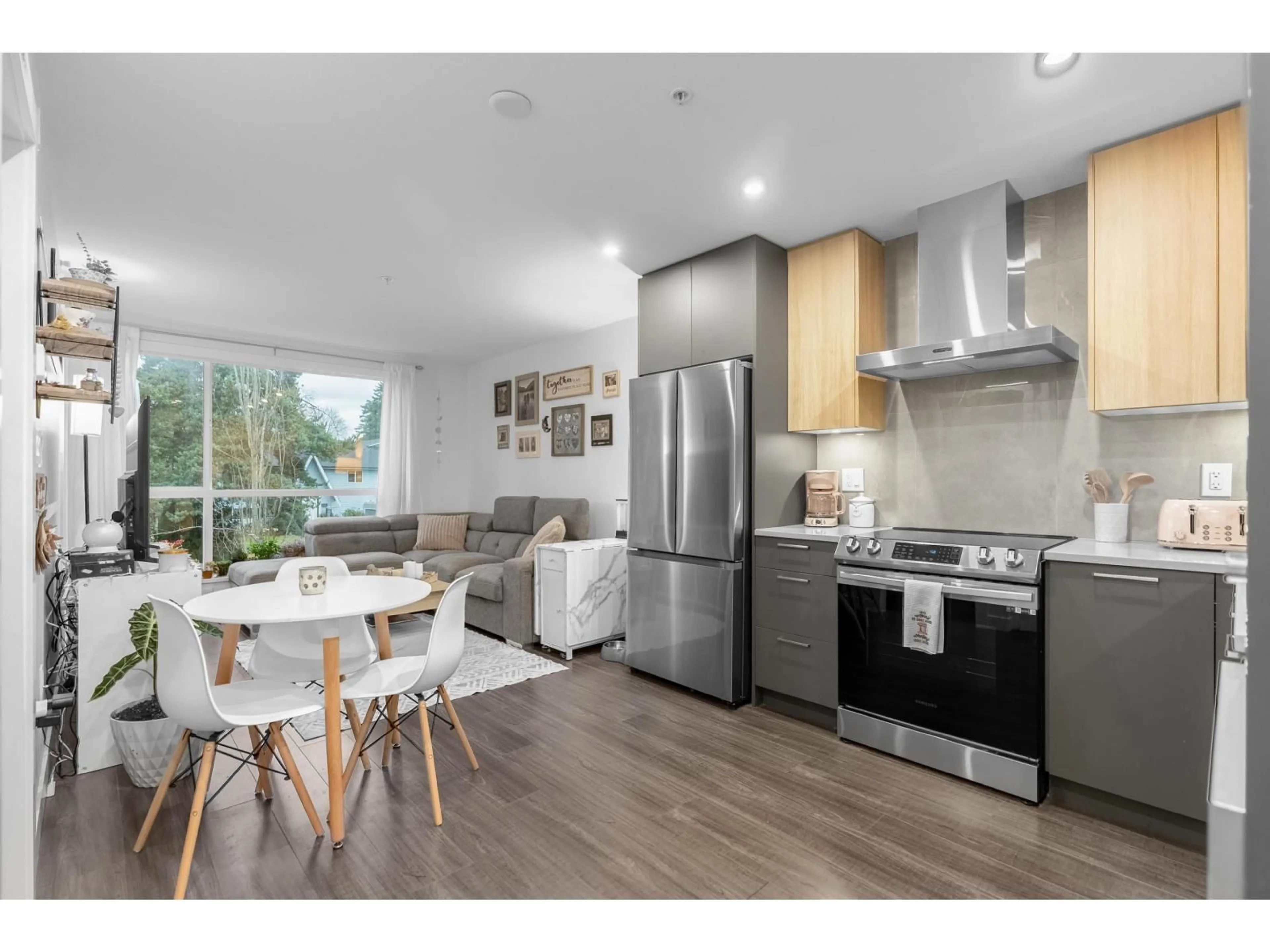 Open concept kitchen, wood/laminate floor for B318 - 31940 RAVEN AVENUE, Mission British Columbia V2V0L1