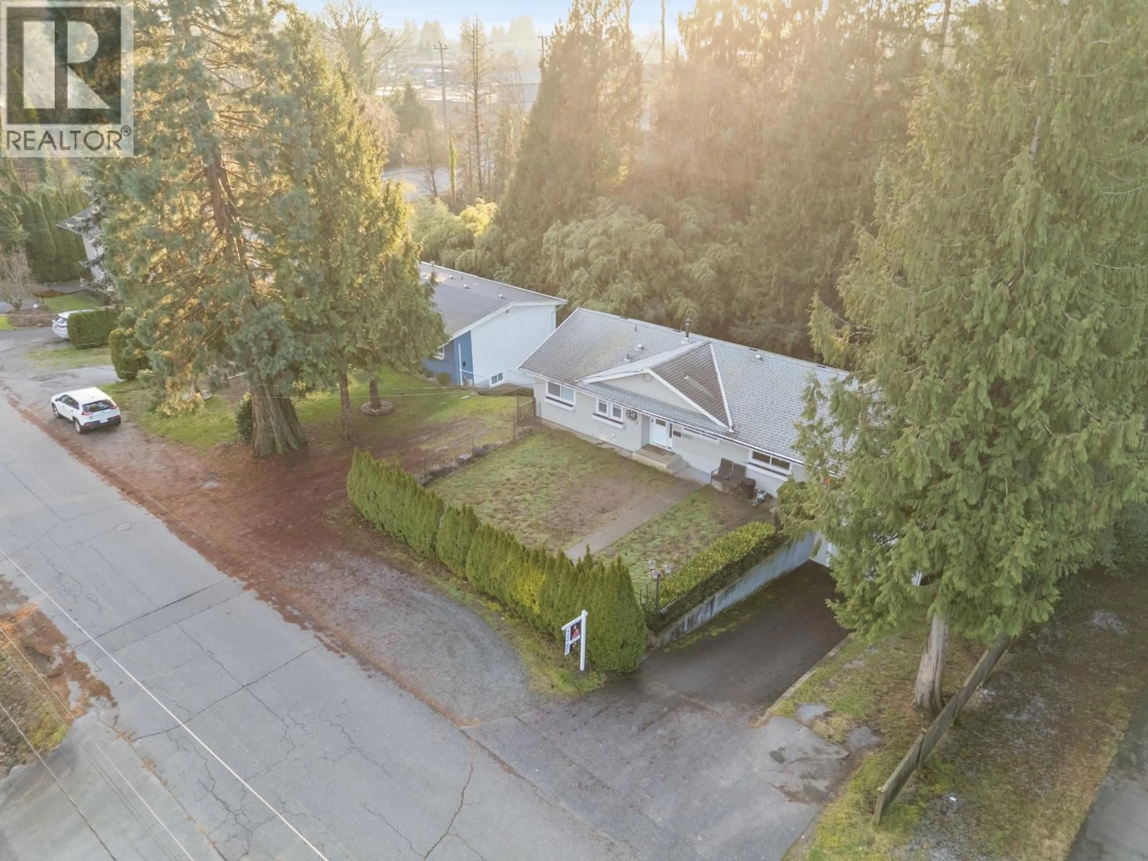 A pic from outside/outdoor area/front of a property/back of a property/a pic from drone, street for 12037 208 STREET, Maple Ridge British Columbia V2X4W9