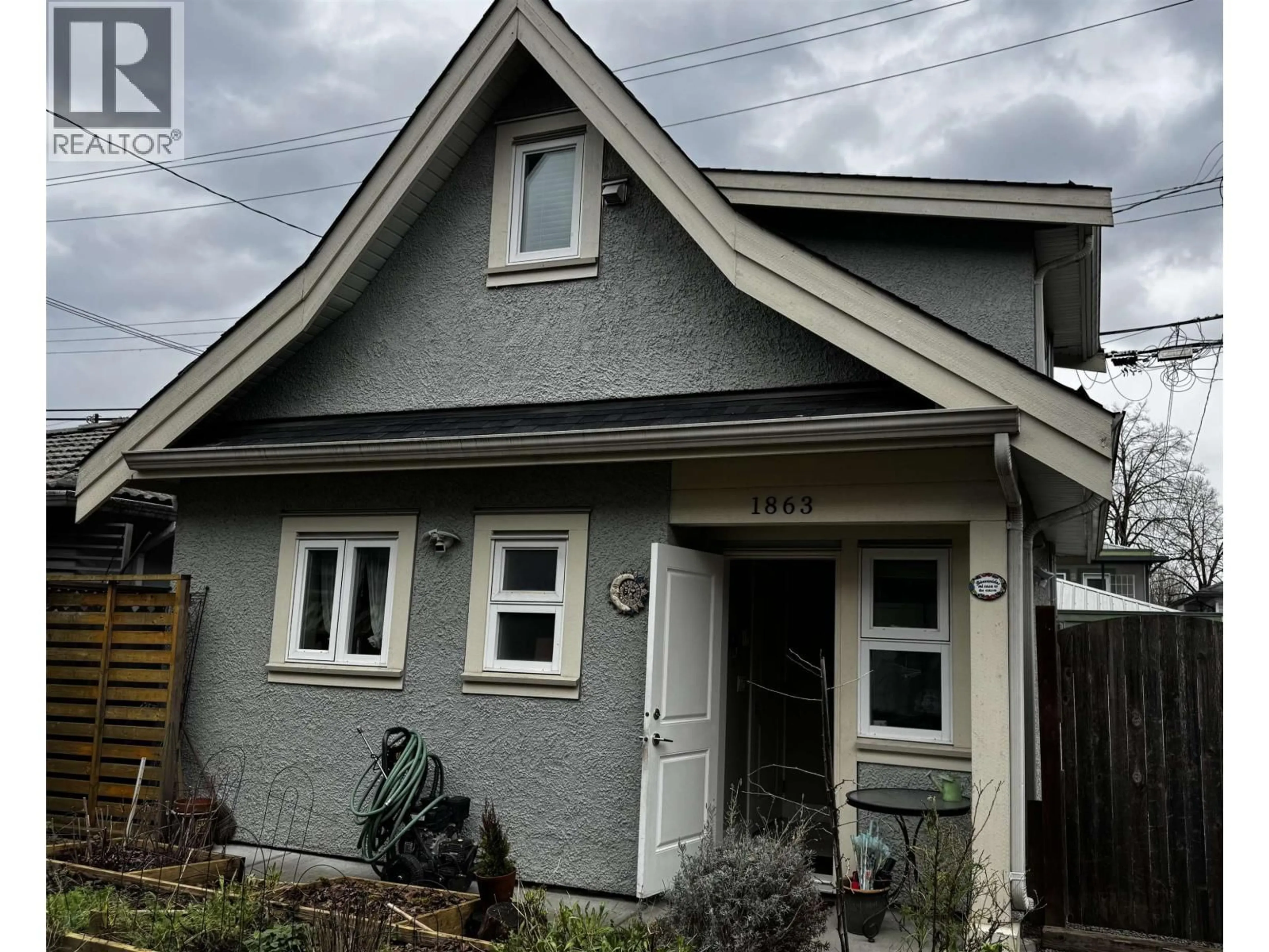 Home with vinyl exterior material, street for 1865 37TH AVENUE, Vancouver British Columbia V5P1E9