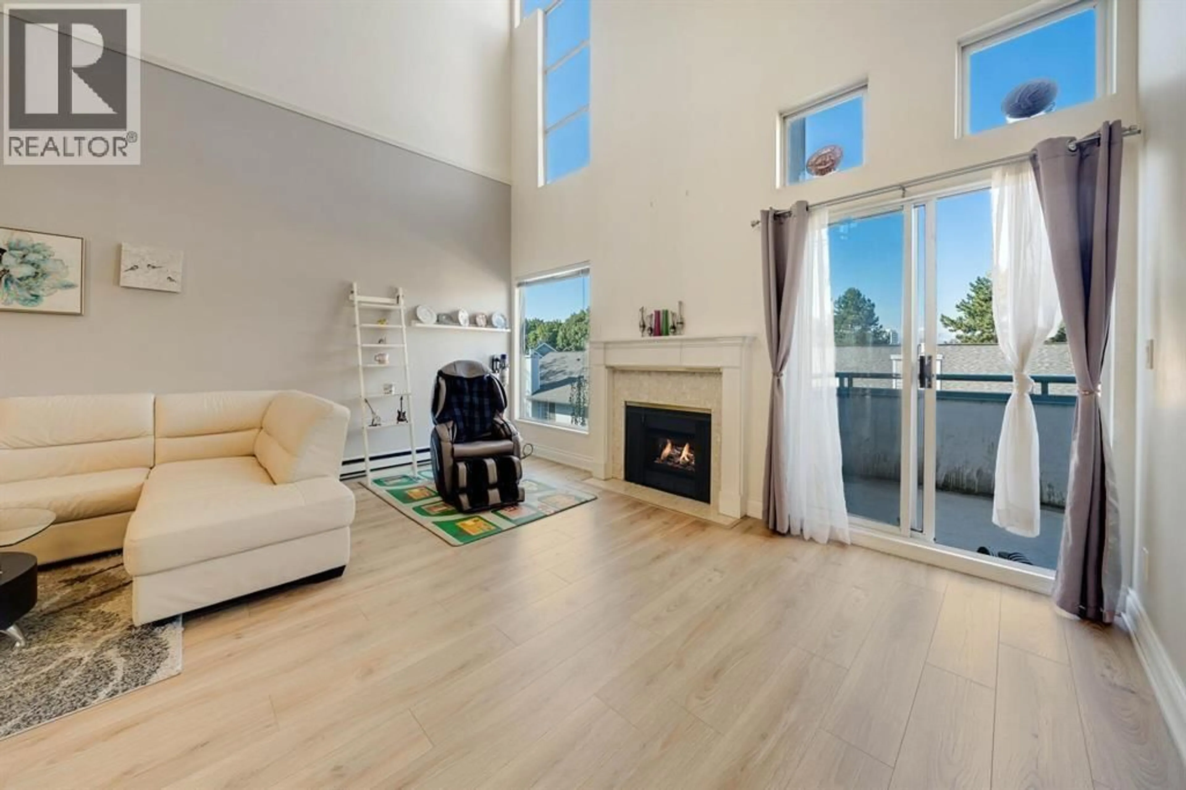 Living room with furniture, wood/laminate floor for 319 - 7500 ABERCROMBIE DRIVE, Richmond British Columbia V6Y3J9