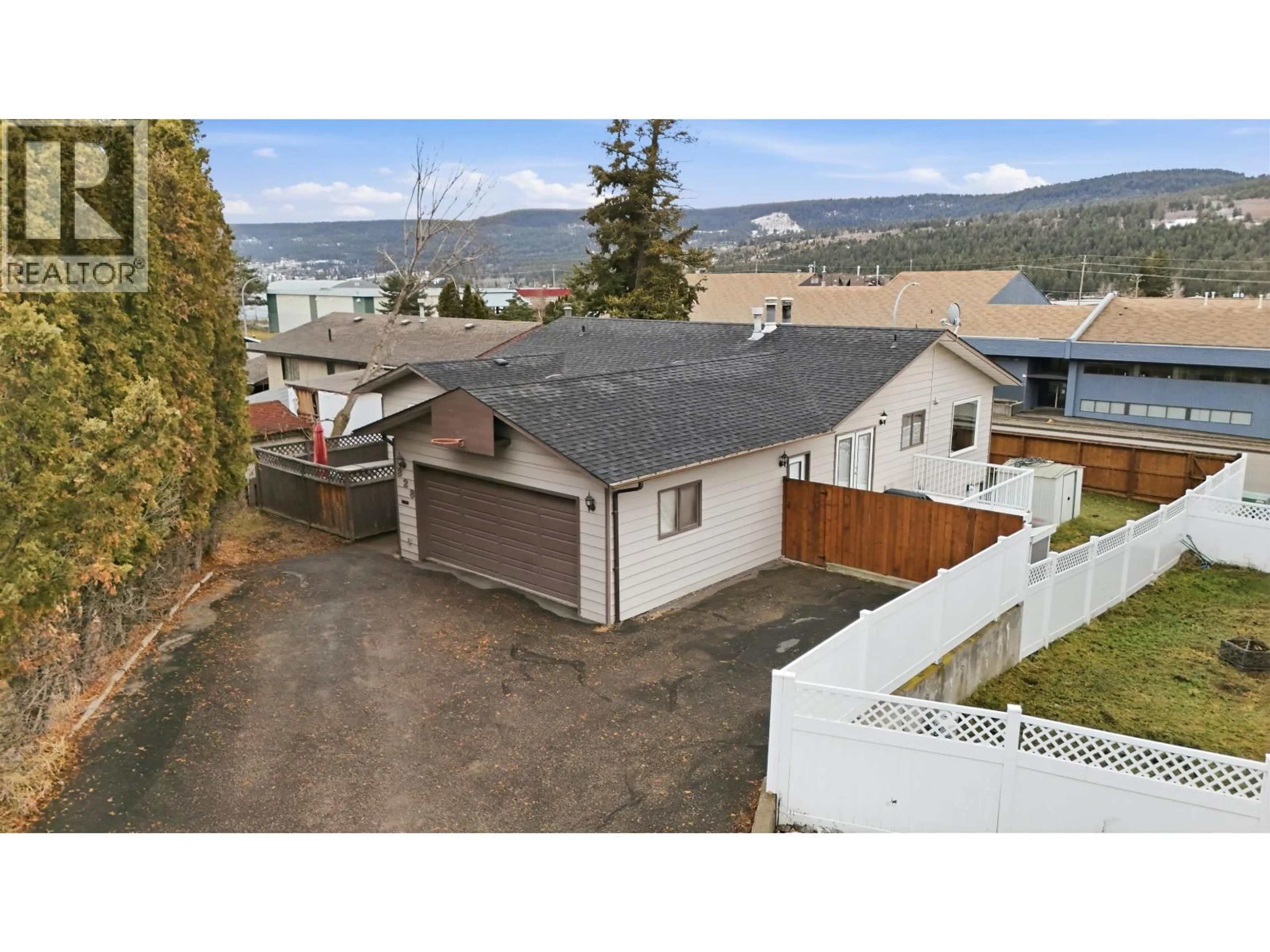 A pic from outside/outdoor area/front of a property/back of a property/a pic from drone, mountain view for 328 LITZENBURG CRESCENT, Williams Lake British Columbia V2G4G8