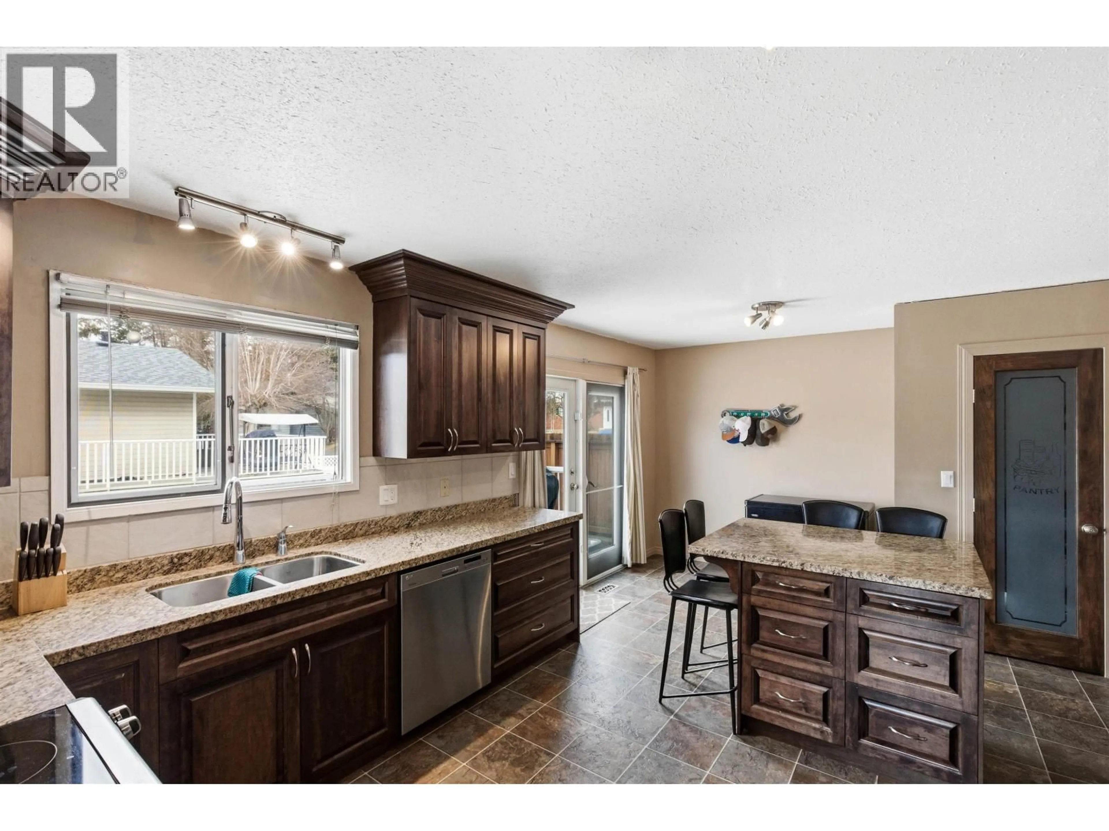 Open concept kitchen, ceramic/tile floor for 328 LITZENBURG CRESCENT, Williams Lake British Columbia V2G4G8