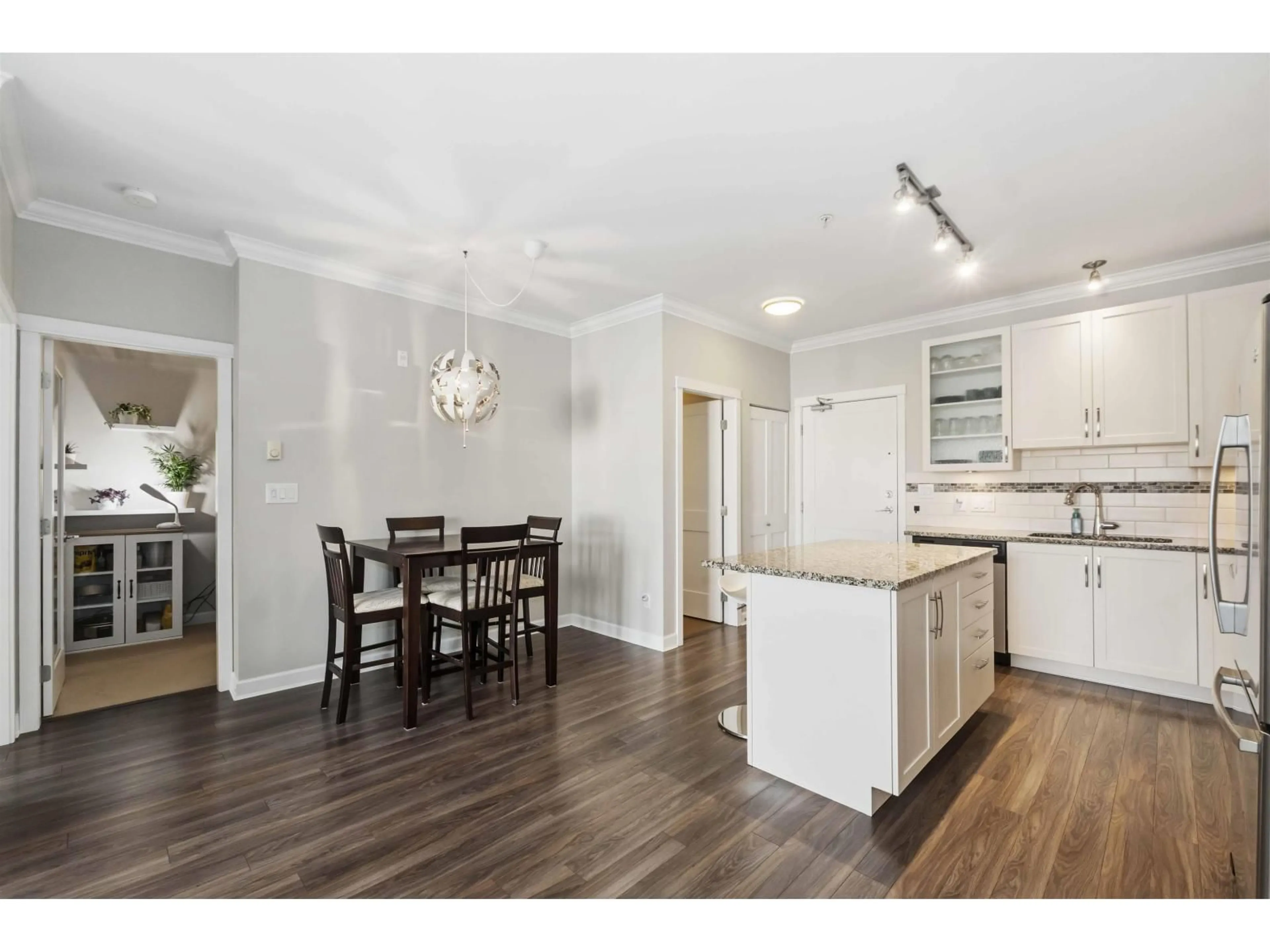 Open concept kitchen, wood/laminate floor for 216 - 20861 83 AVENUE, Langley British Columbia V2Y0M8