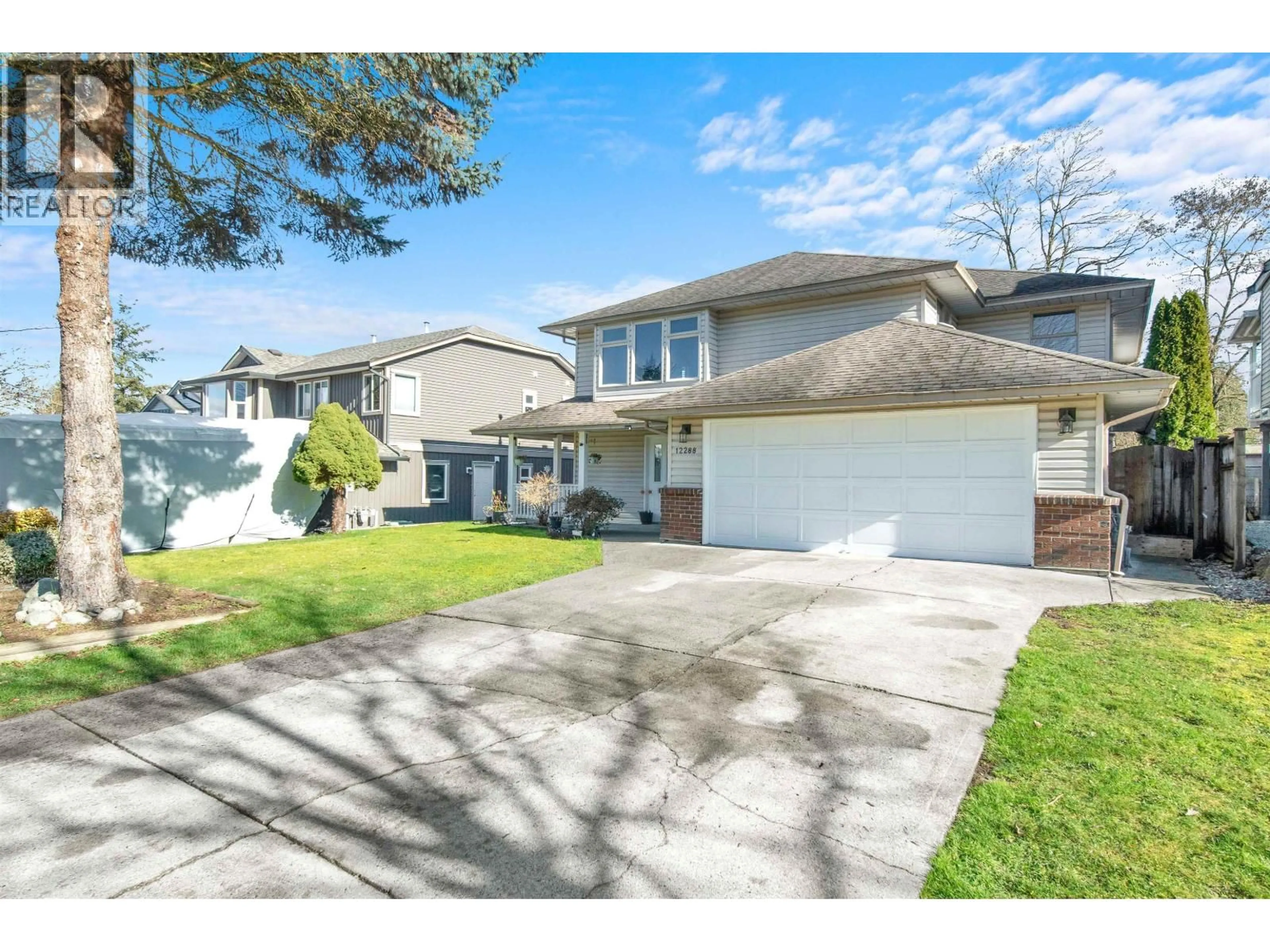 Home with vinyl exterior material, street for 12288 233 STREET, Maple Ridge British Columbia V2X0R9