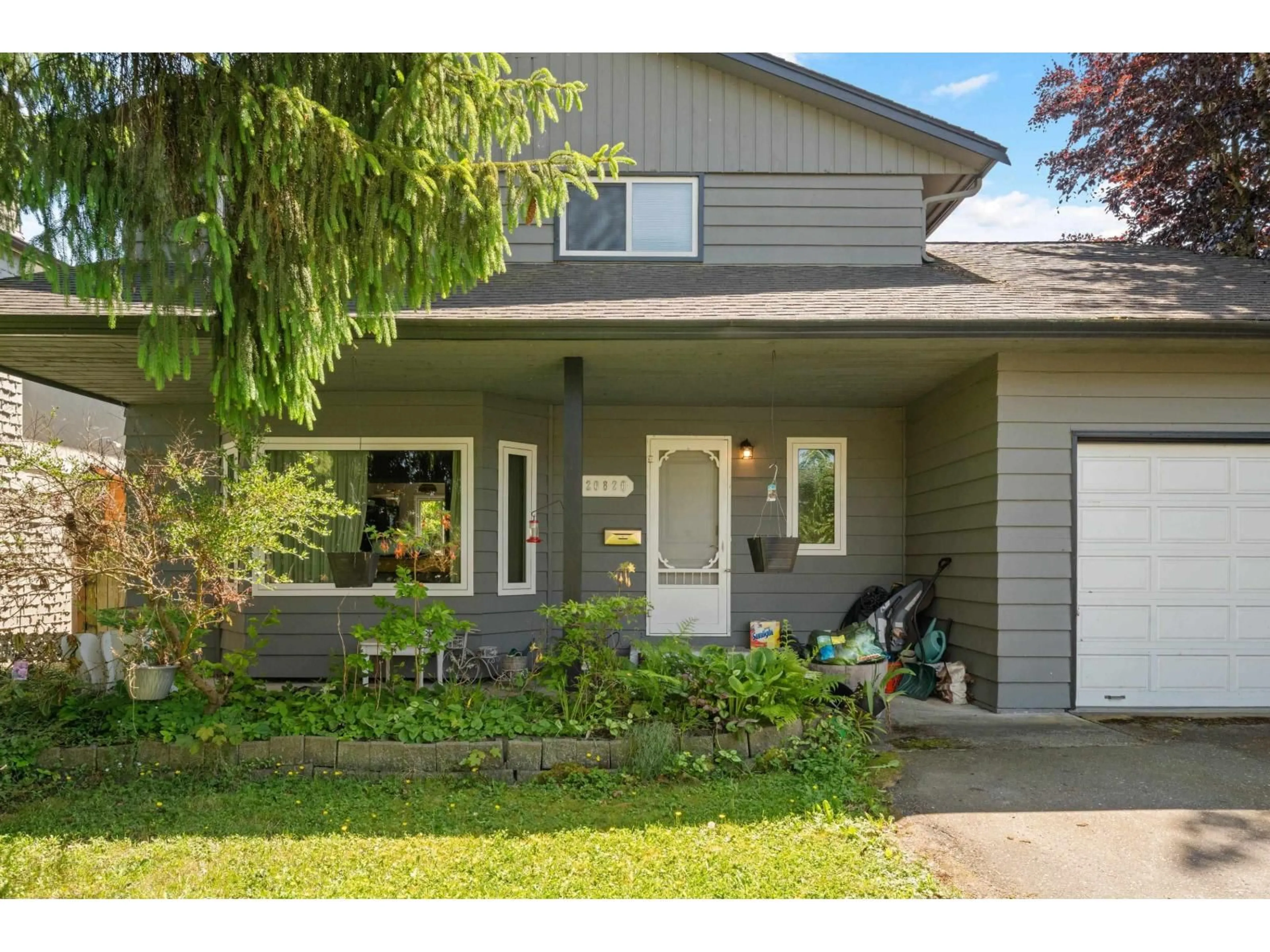 Home with vinyl exterior material, street for 20820 51 AVENUE, Langley British Columbia V3A5C1