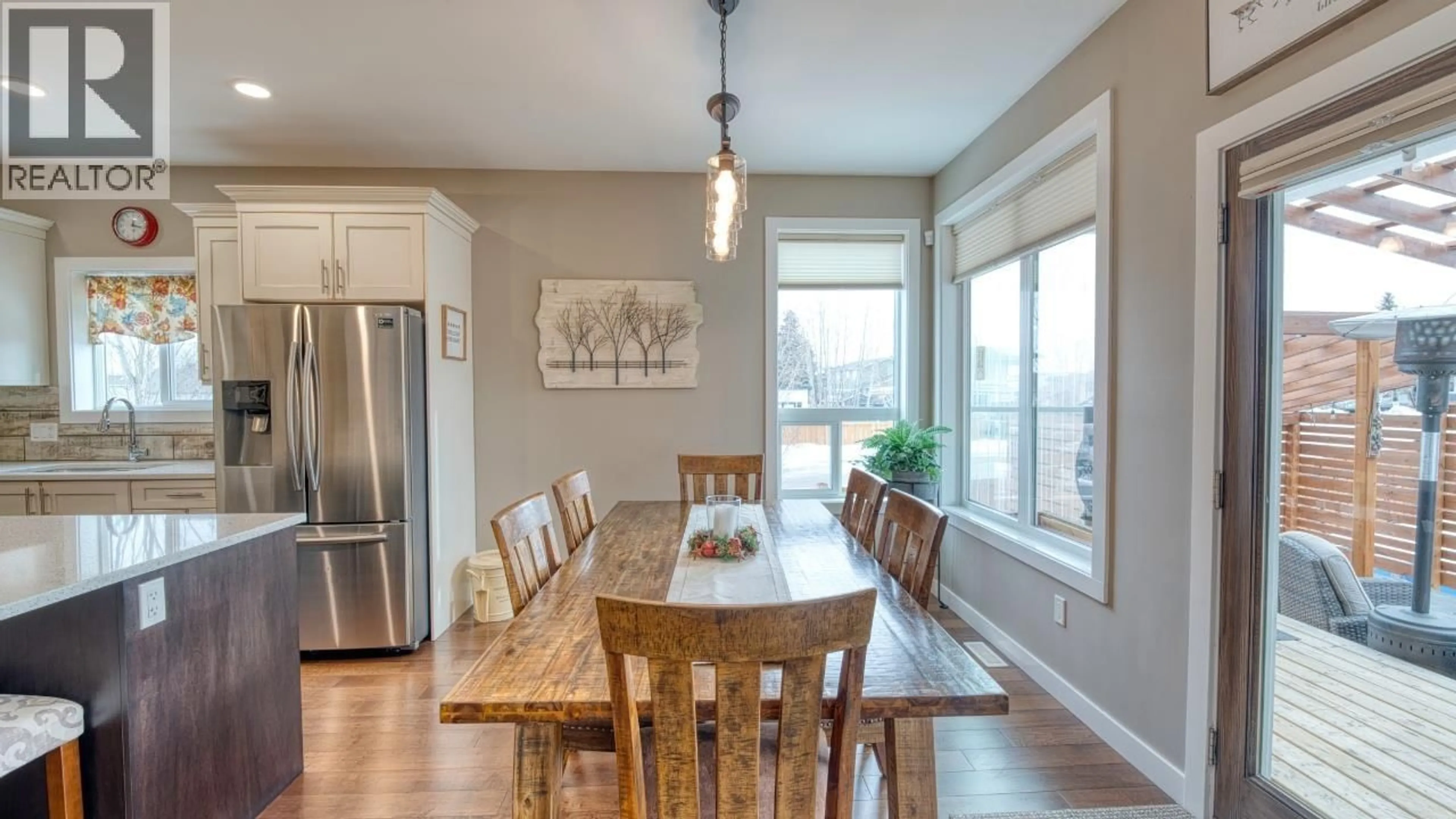 Dining room, wood/laminate floor for 10603 114A AVENUE, Fort St. John British Columbia V1J0S1
