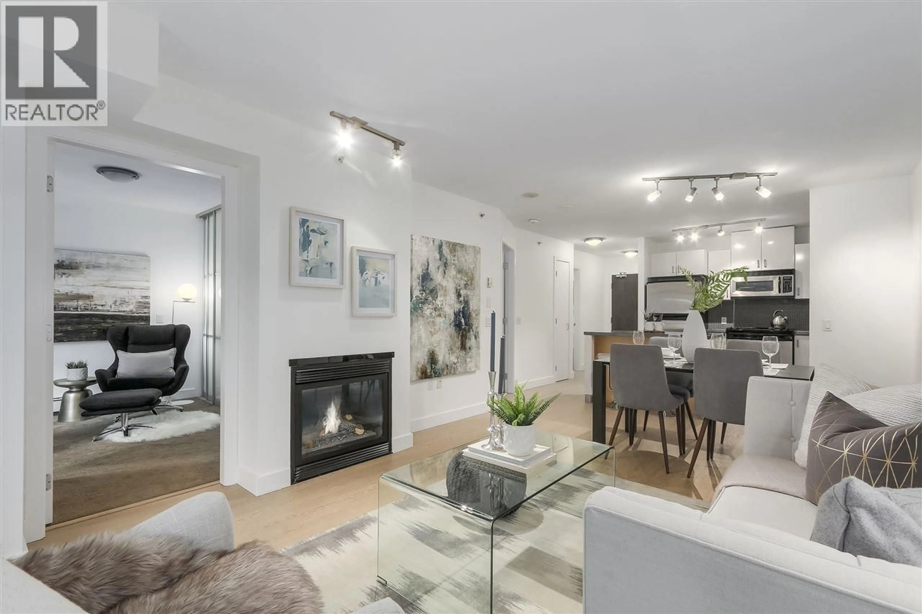 Living room with furniture, unknown for 104 - 175 1ST STREET, North Vancouver British Columbia V7M3N9