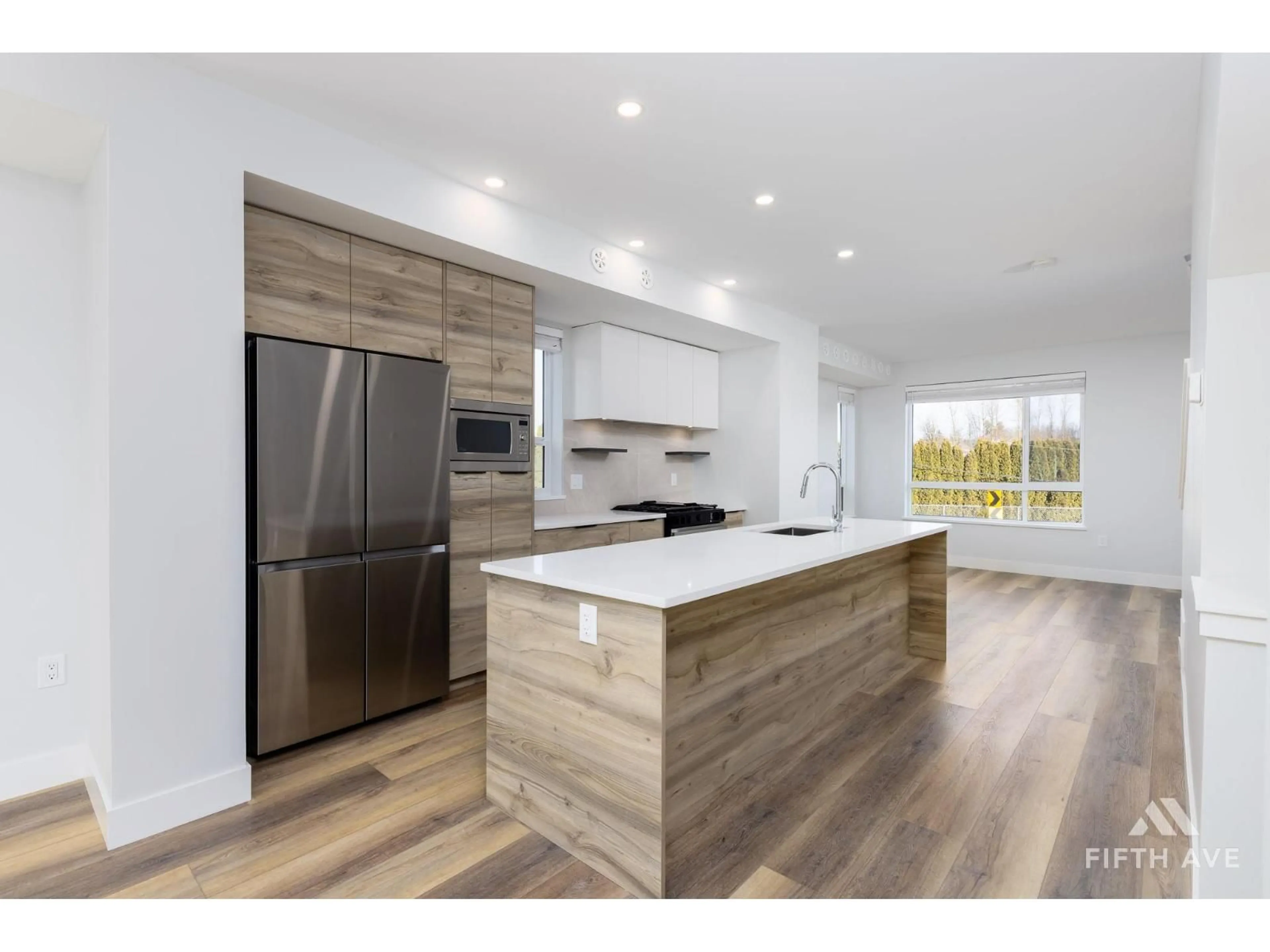 Open concept kitchen, wood/laminate floor for 81 - 30530 CARDINAL AVENUE, Abbotsford British Columbia V2T0L5