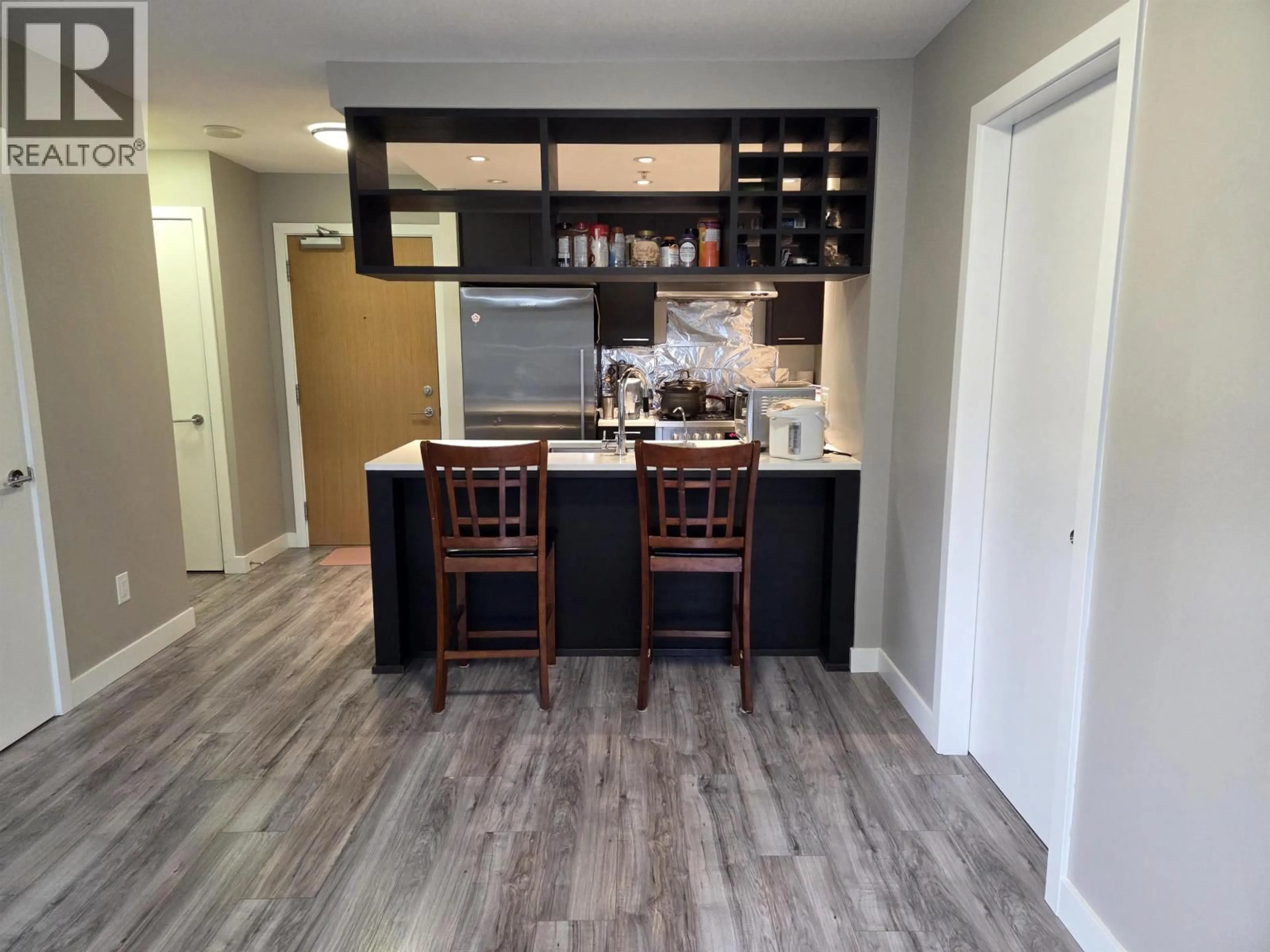 Open concept kitchen, wood/laminate floor for 510 - 6188 NO. 3 ROAD, Richmond British Columbia V6Y0J3