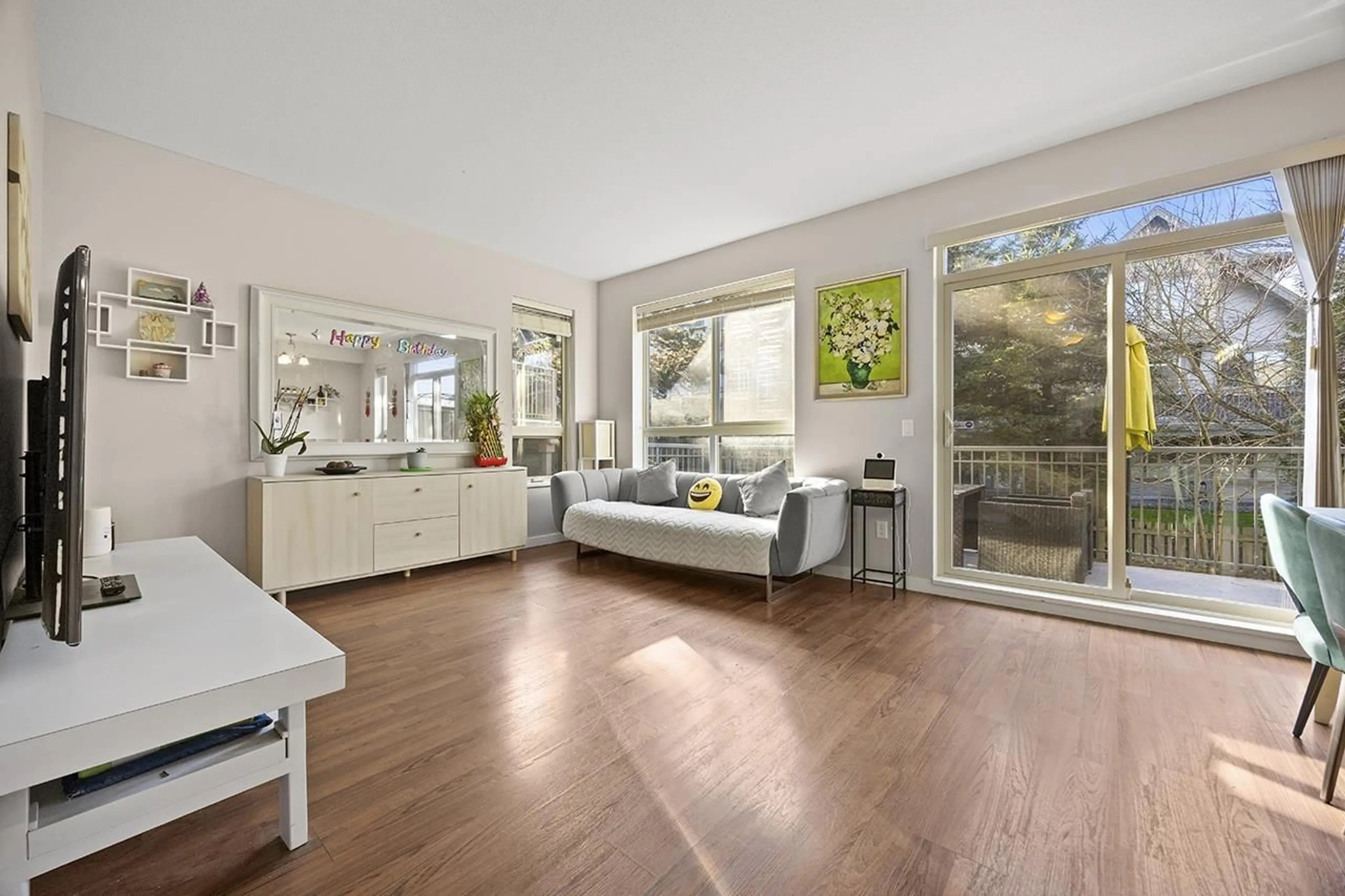 Living room with furniture, wood/laminate floor for 67 - 2738 158 STREET, Surrey British Columbia V3Z3K3