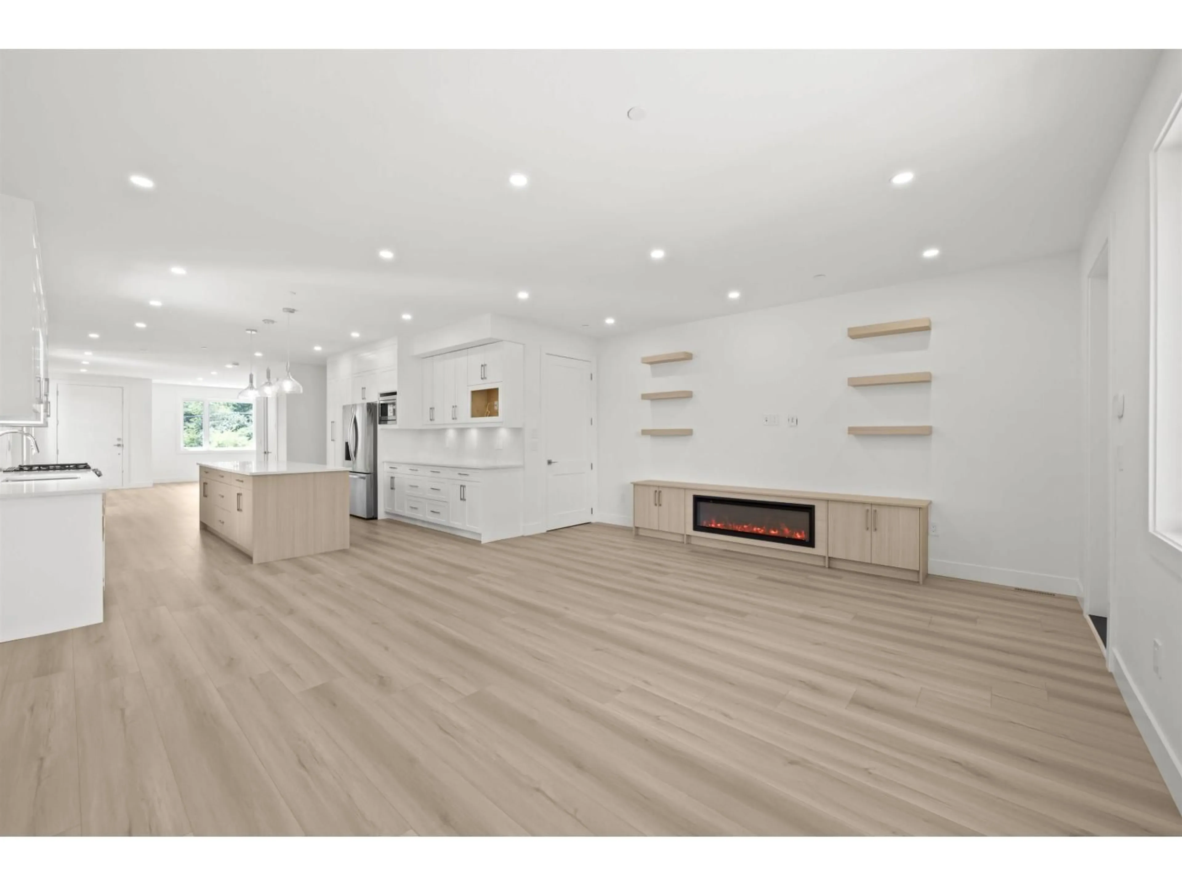 Open concept kitchen, wood/laminate floor for 2 - 26725 FRASER HIGHWAY, Langley British Columbia V4W3L1