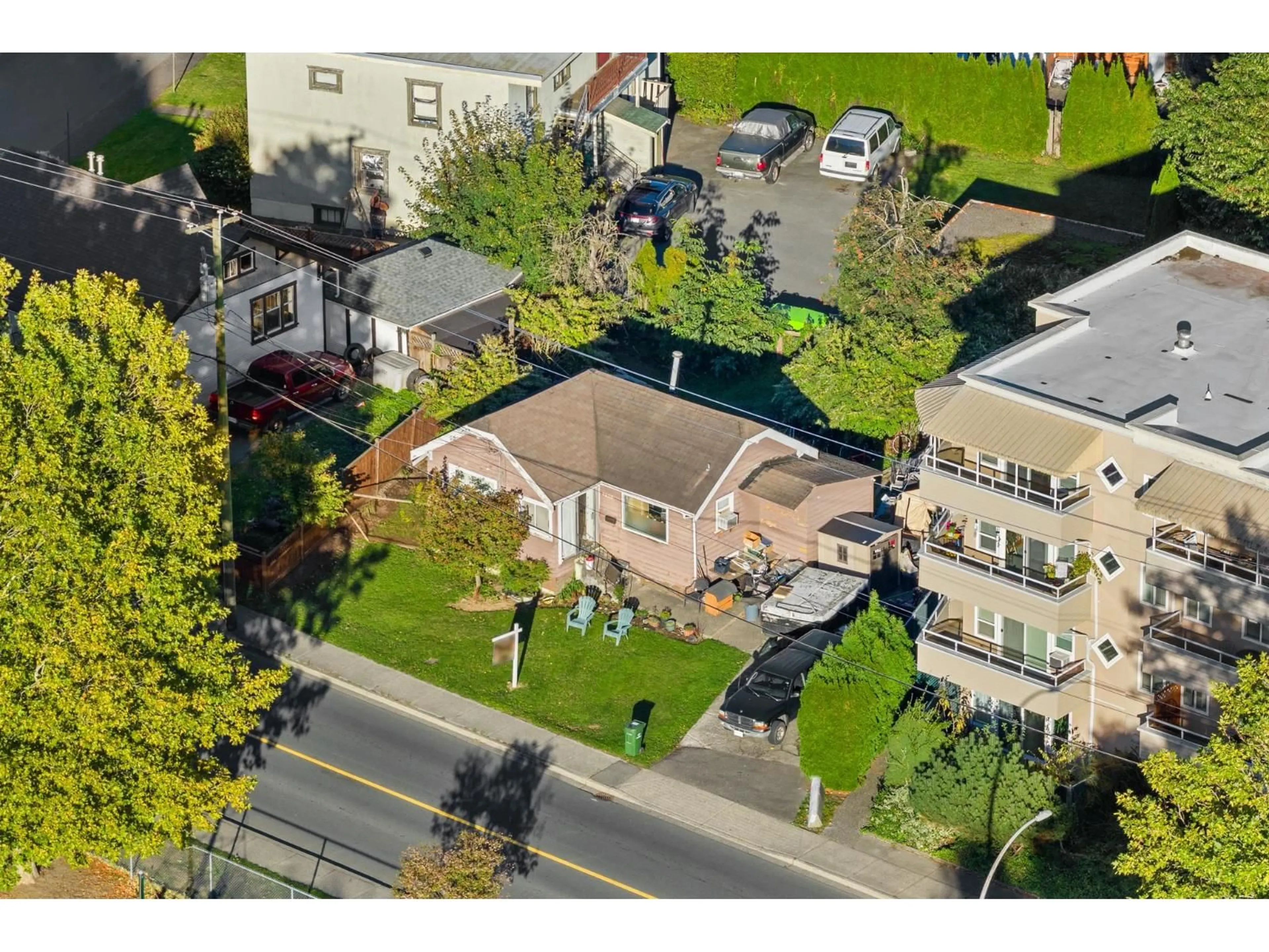 A pic from outside/outdoor area/front of a property/back of a property/a pic from drone, street for 9430 YOUNG ROAD, Chilliwack British Columbia V2P4S5