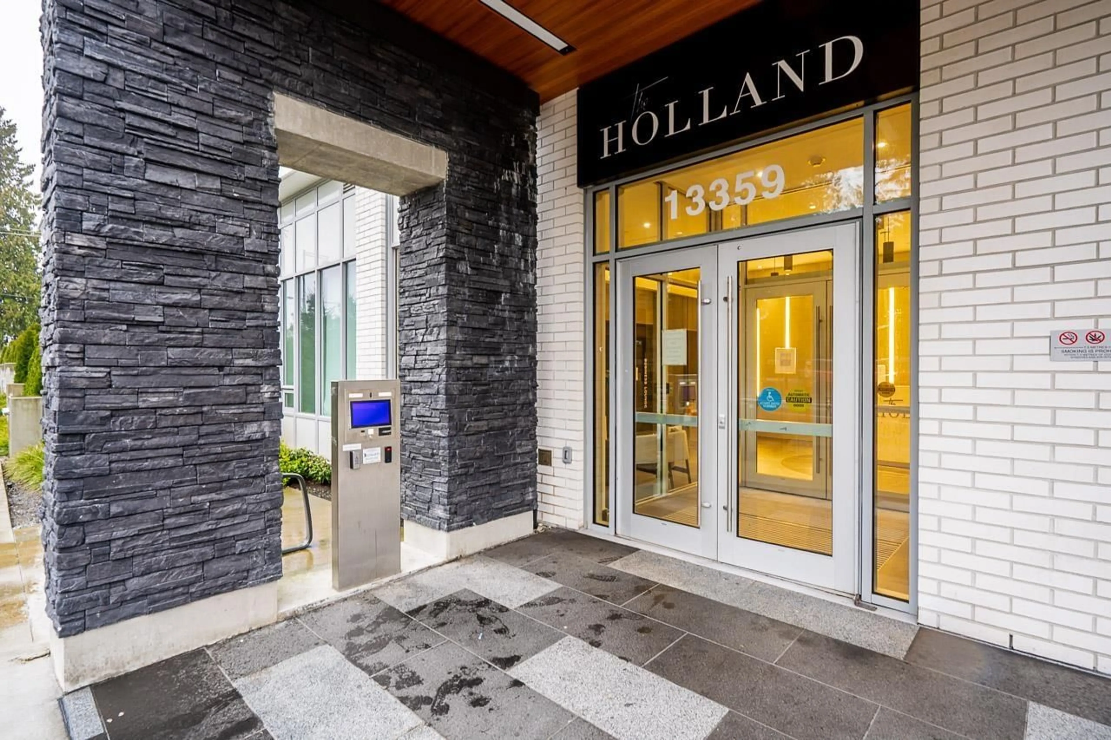 Indoor foyer for 2305 - 13359 OLD YALE ROAD, Surrey British Columbia V3T0S4