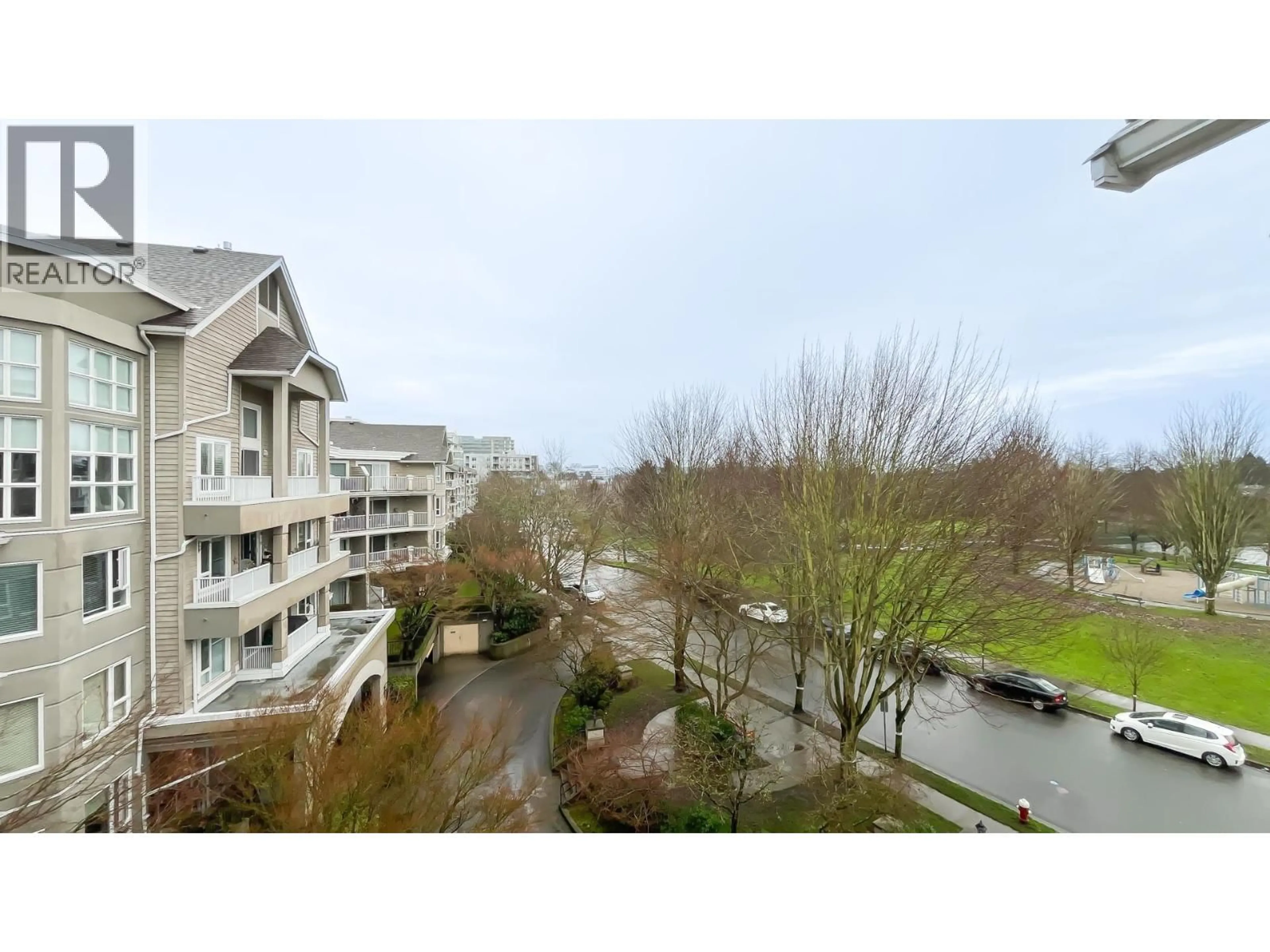 A pic from outside/outdoor area/front of a property/back of a property/a pic from drone, water/lake/river/ocean view for 425 - 5888 DOVER CRESCENT, Richmond British Columbia V7C5R9