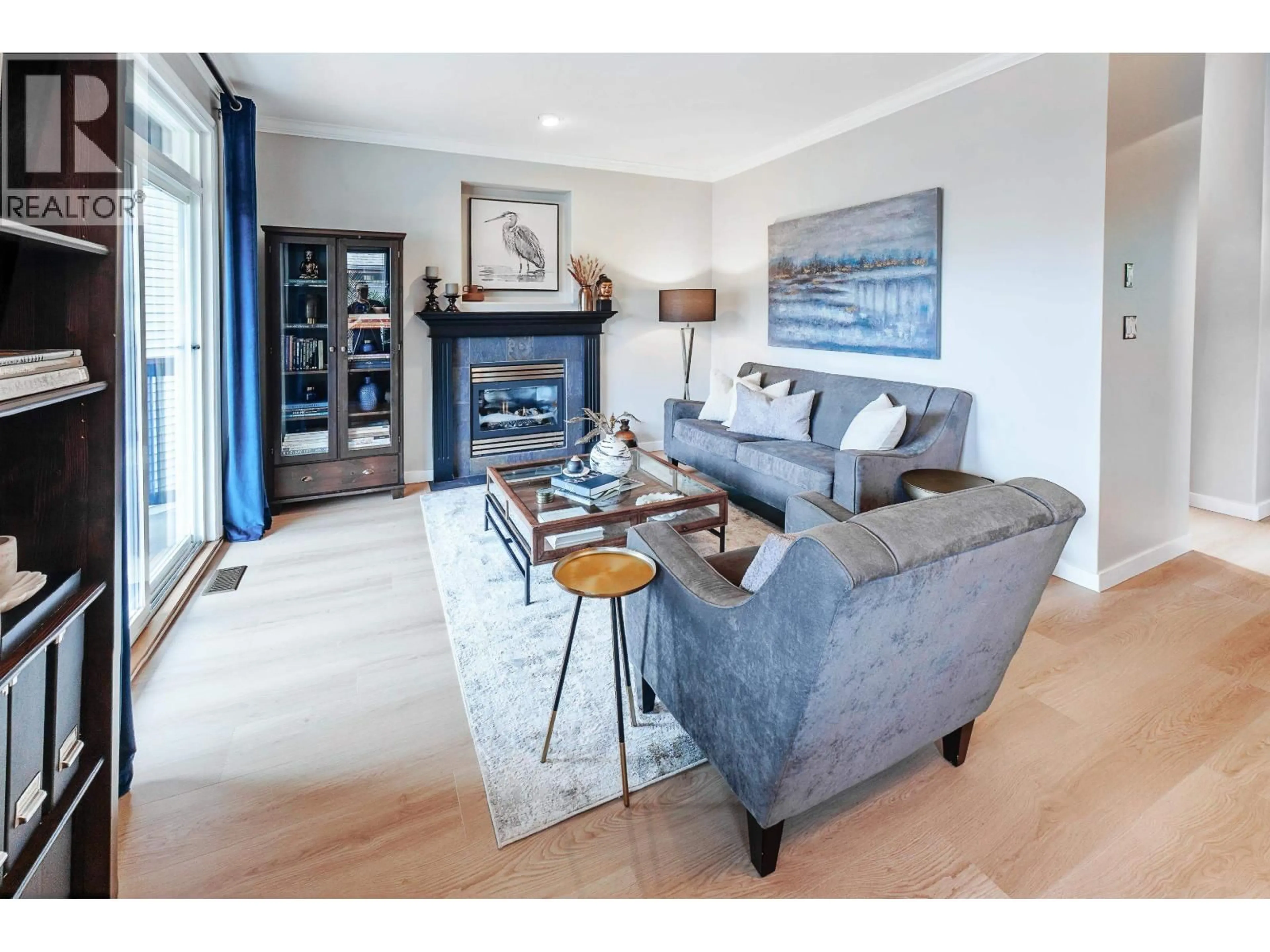 Living room with furniture, wood/laminate floor for 35 - 2287 ARGUE STREET, Port Coquitlam British Columbia V3C6R2