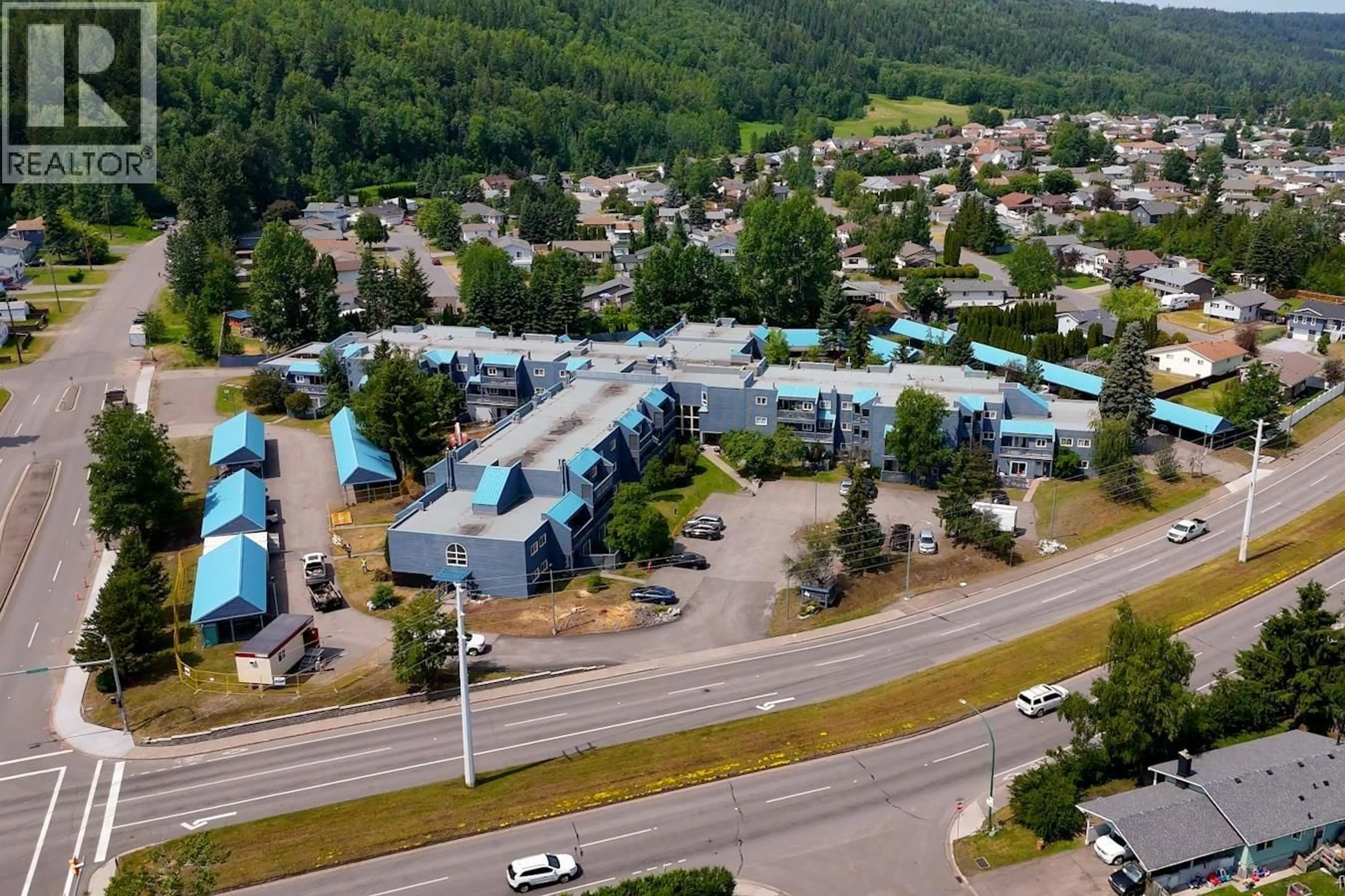 A pic from outside/outdoor area/front of a property/back of a property/a pic from drone, mountain view for 211 - 3033 OSPIKA BOULEVARD, Prince George British Columbia V2N4L5