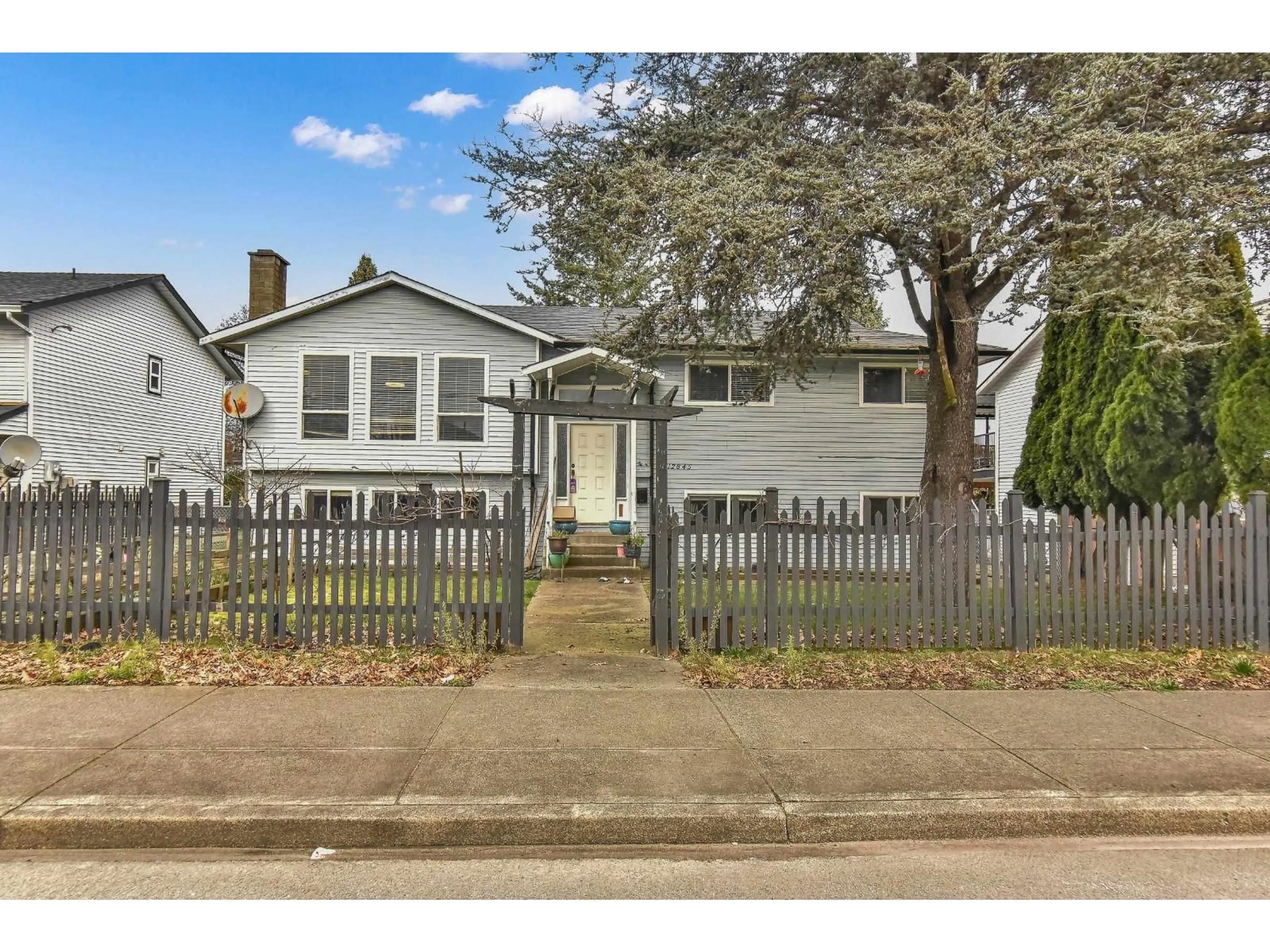 Home with vinyl exterior material, street for 12845 64 AVENUE, Surrey British Columbia V3W1X4