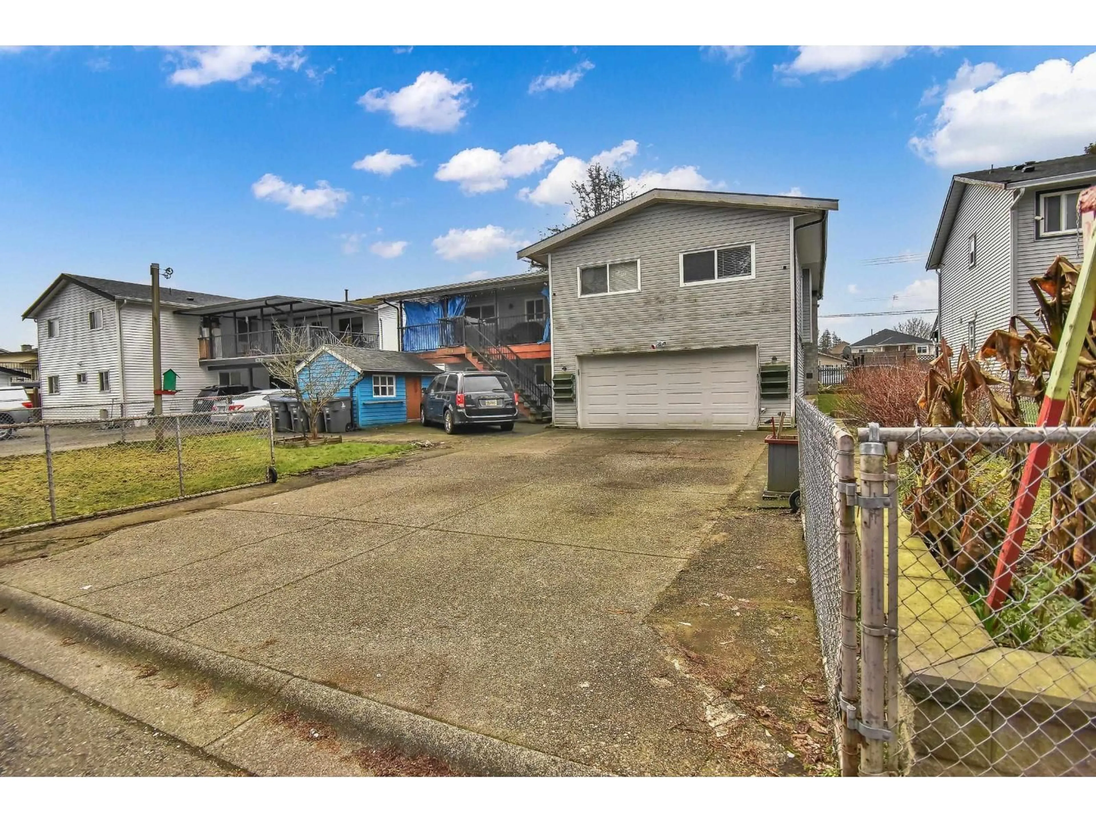 A pic from outside/outdoor area/front of a property/back of a property/a pic from drone, street for 12845 64 AVENUE, Surrey British Columbia V3W1X4