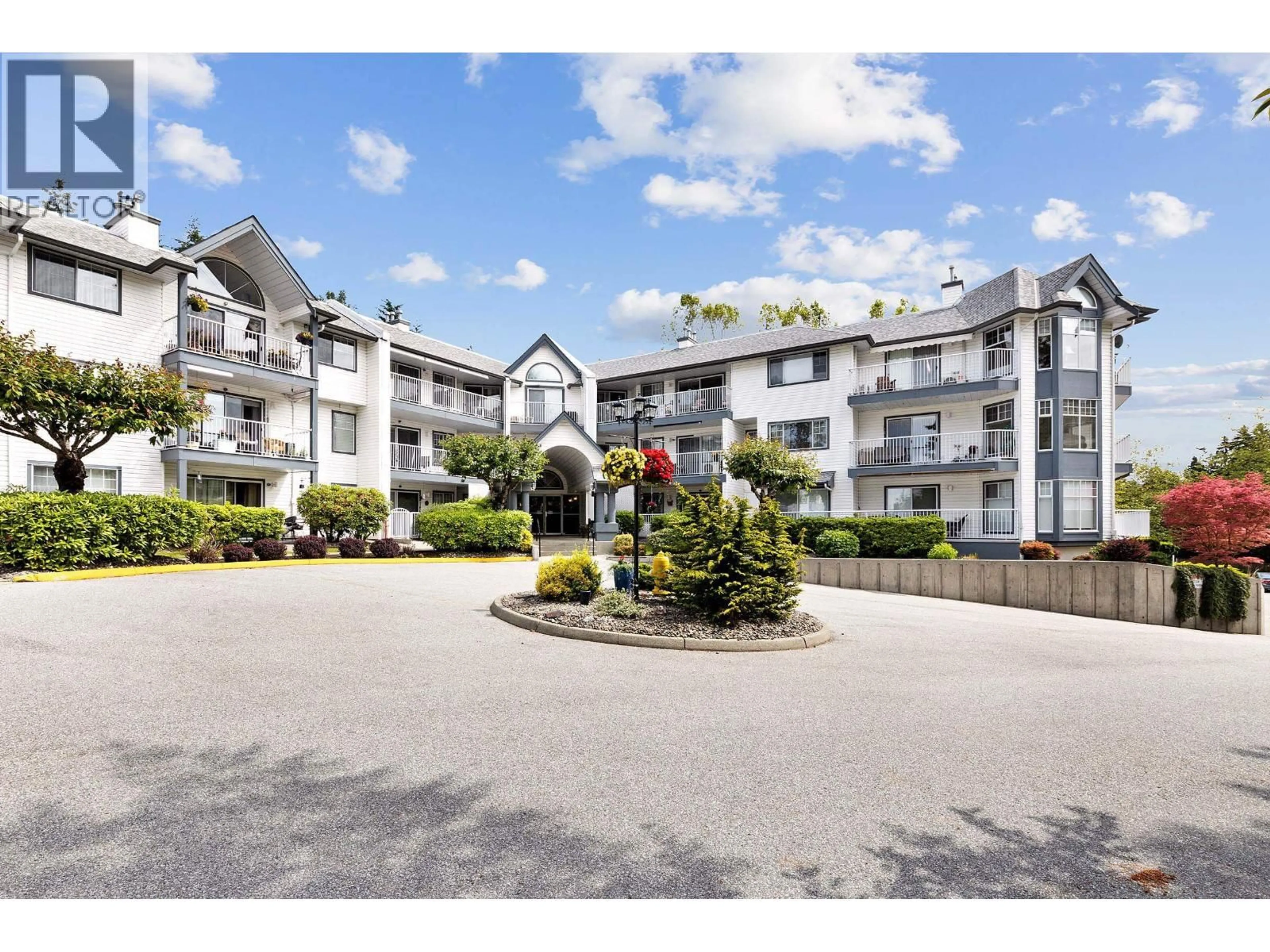 A pic from outside/outdoor area/front of a property/back of a property/a pic from drone, mountain view for 207 - 11601 227 STREET, Maple Ridge British Columbia V2X0J7