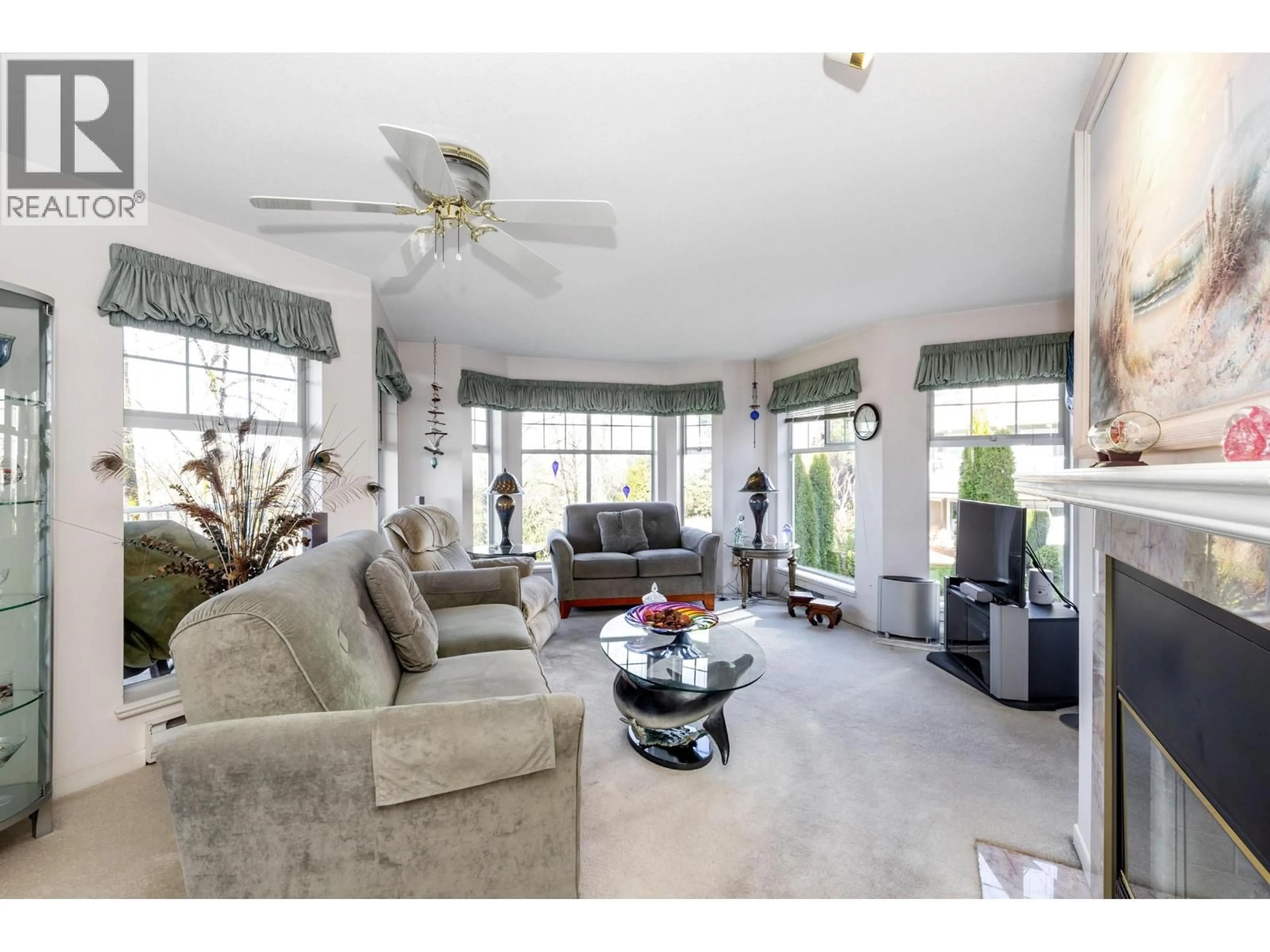 Living room with furniture, ceramic/tile floor for 207 - 11601 227 STREET, Maple Ridge British Columbia V2X0J7