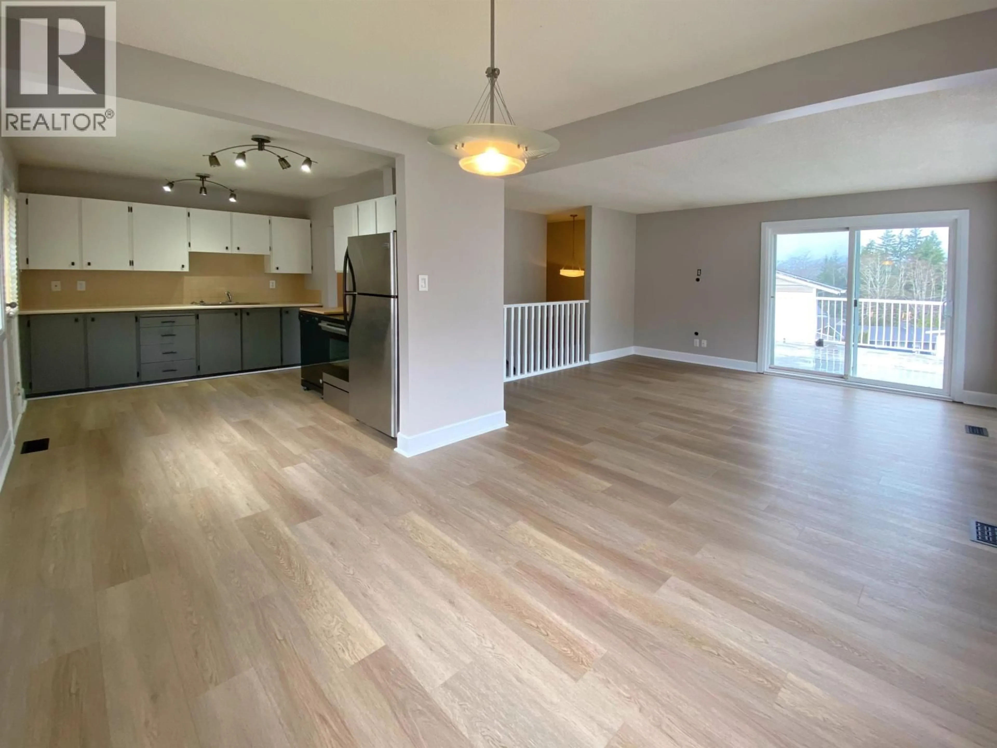 Open concept kitchen, wood/laminate floor for 192 CRESTVIEW DRIVE, Prince Rupert British Columbia V8J2Z7