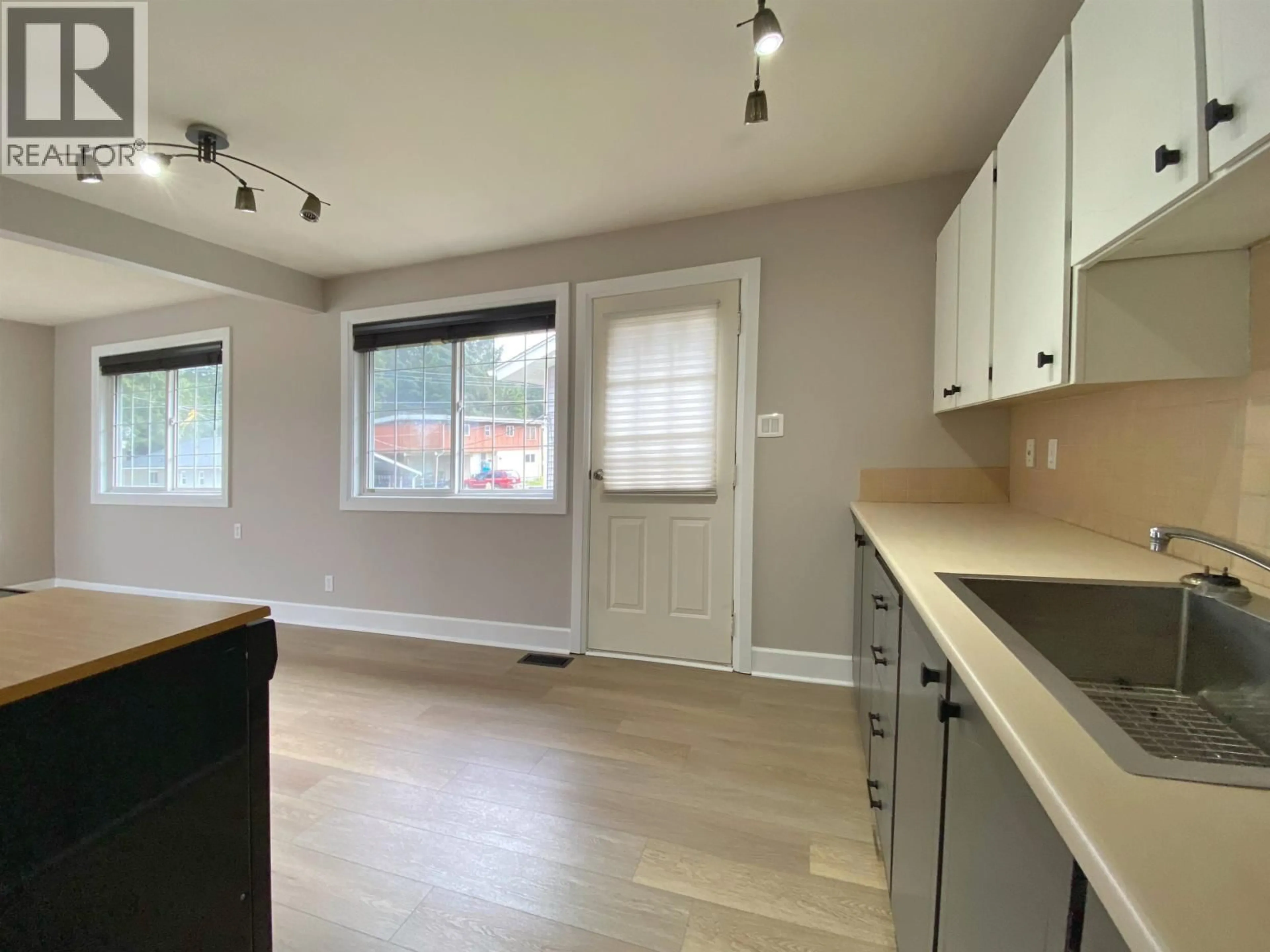 Open concept kitchen, wood/laminate floor for 192 CRESTVIEW DRIVE, Prince Rupert British Columbia V8J2Z7