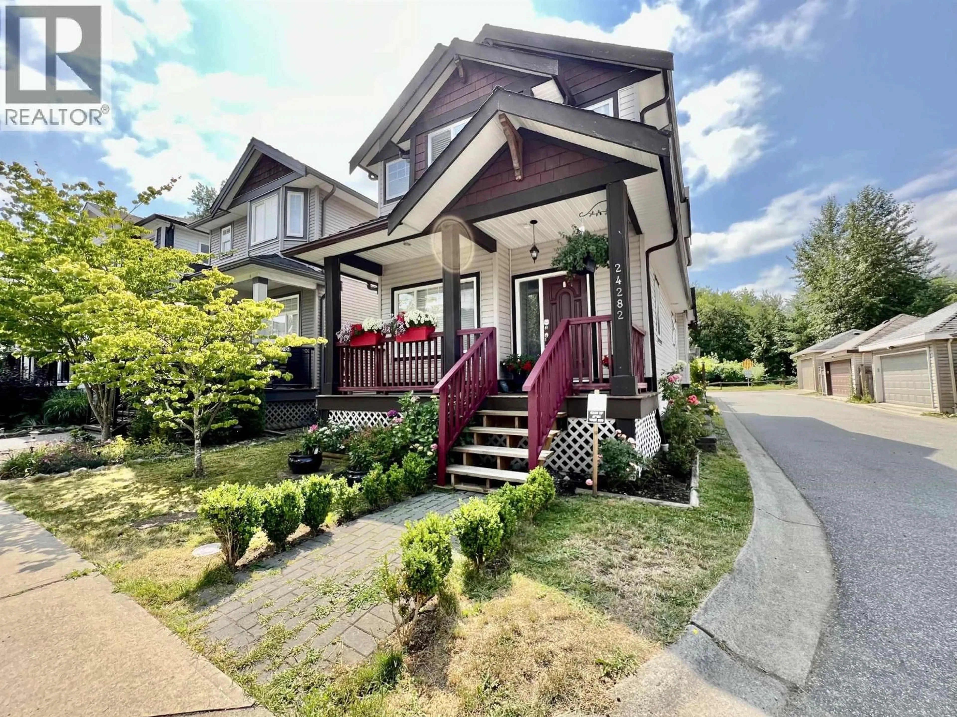 A pic from outside/outdoor area/front of a property/back of a property/a pic from drone, street for 24282 101A AVENUE, Maple Ridge British Columbia V2W0C2