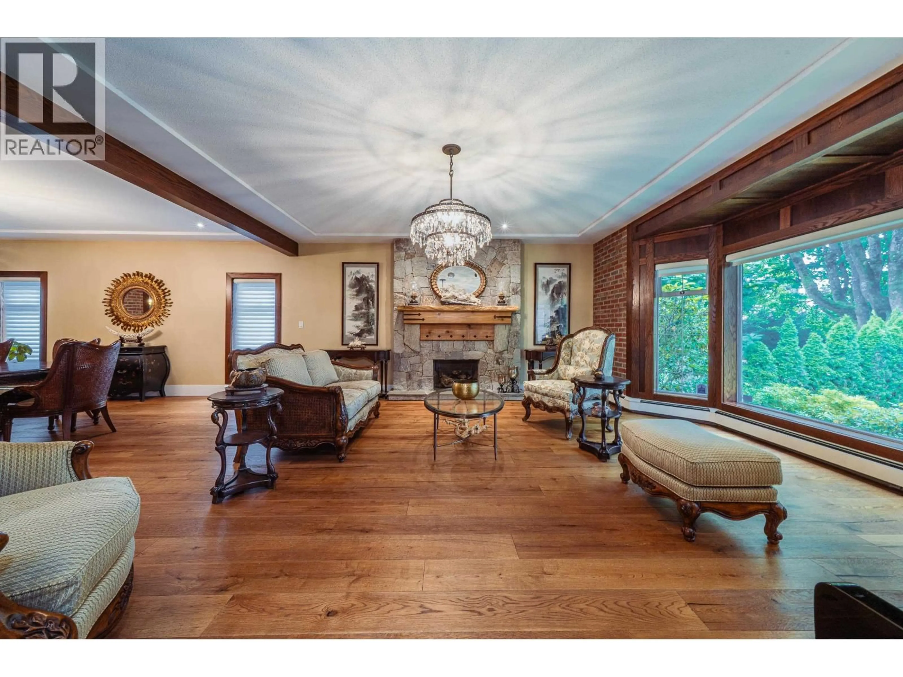 Living room with furniture, wood/laminate floor for 6336 WILTSHIRE STREET, Vancouver British Columbia V6M3M4