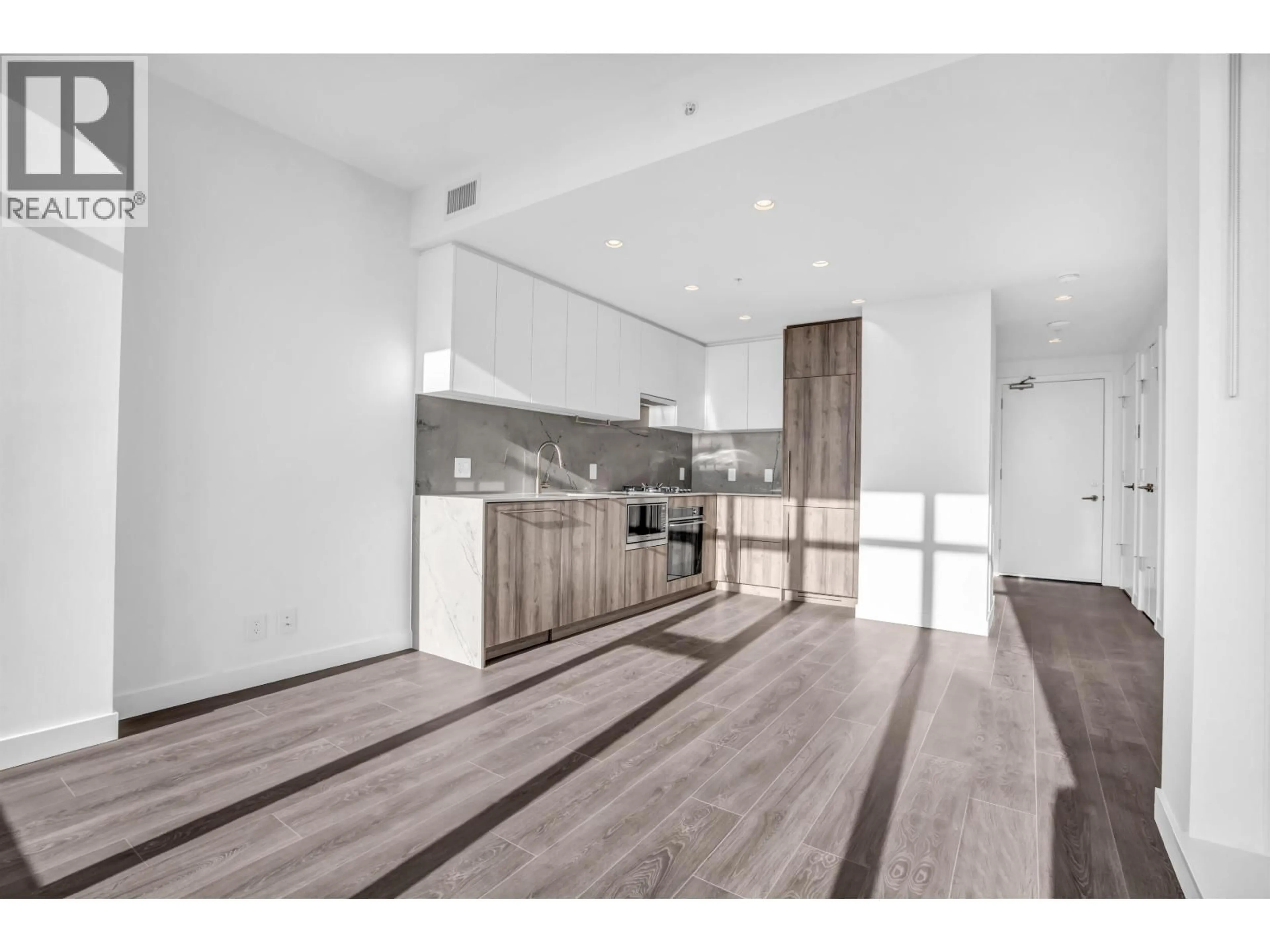 Open concept kitchen, wood/laminate floor for 1603 - 505 NELSON STREET, Coquitlam British Columbia V3J0R5