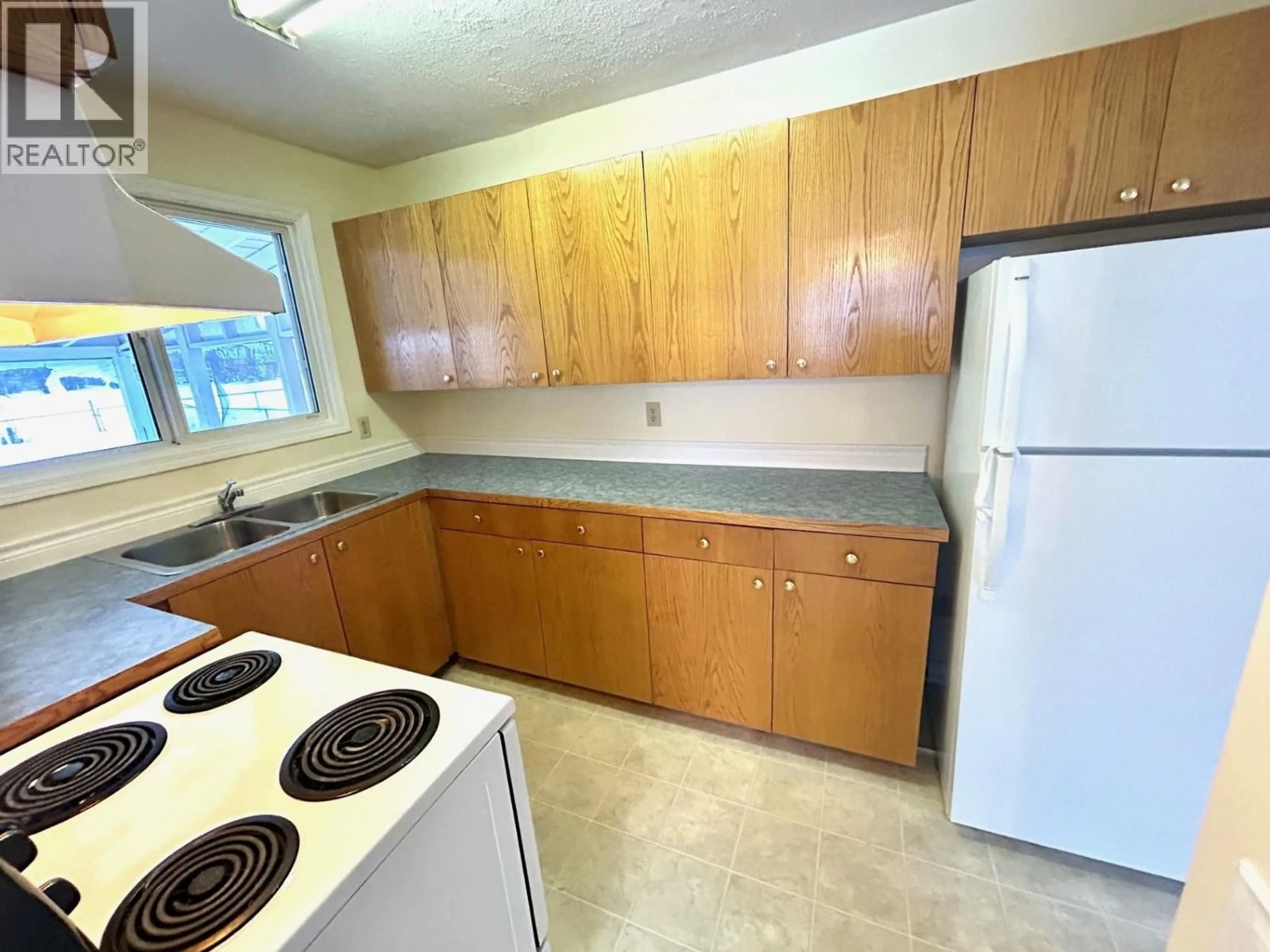 Standard kitchen, unknown for 5235 COTTONWOOD ROAD, Fort Nelson British Columbia V0C1R0