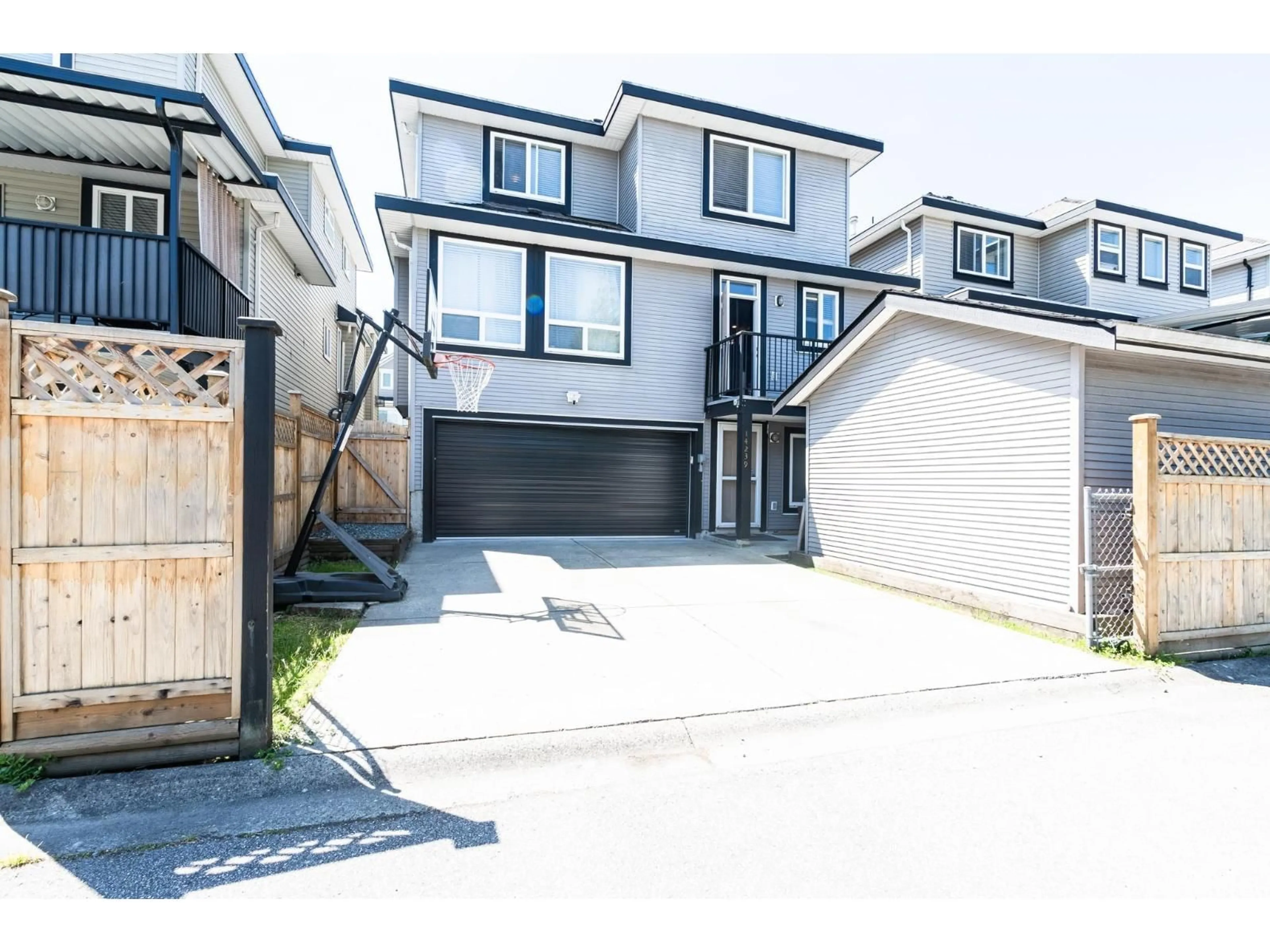 A pic from outside/outdoor area/front of a property/back of a property/a pic from drone, street for 14239 62 AVENUE, Surrey British Columbia V3X0B8