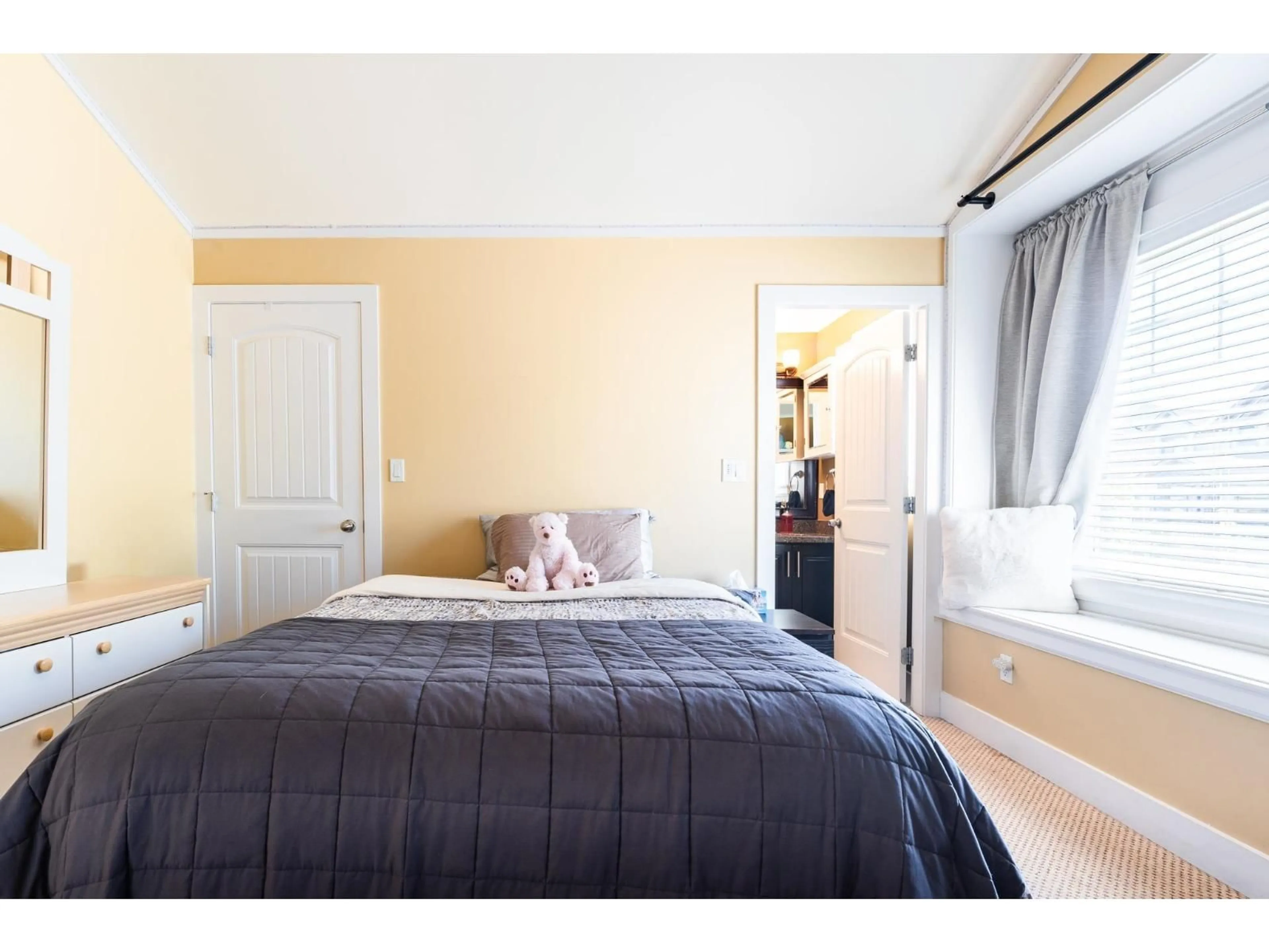 Bedroom with bed, wood/laminate floor for 14239 62 AVENUE, Surrey British Columbia V3X0B8