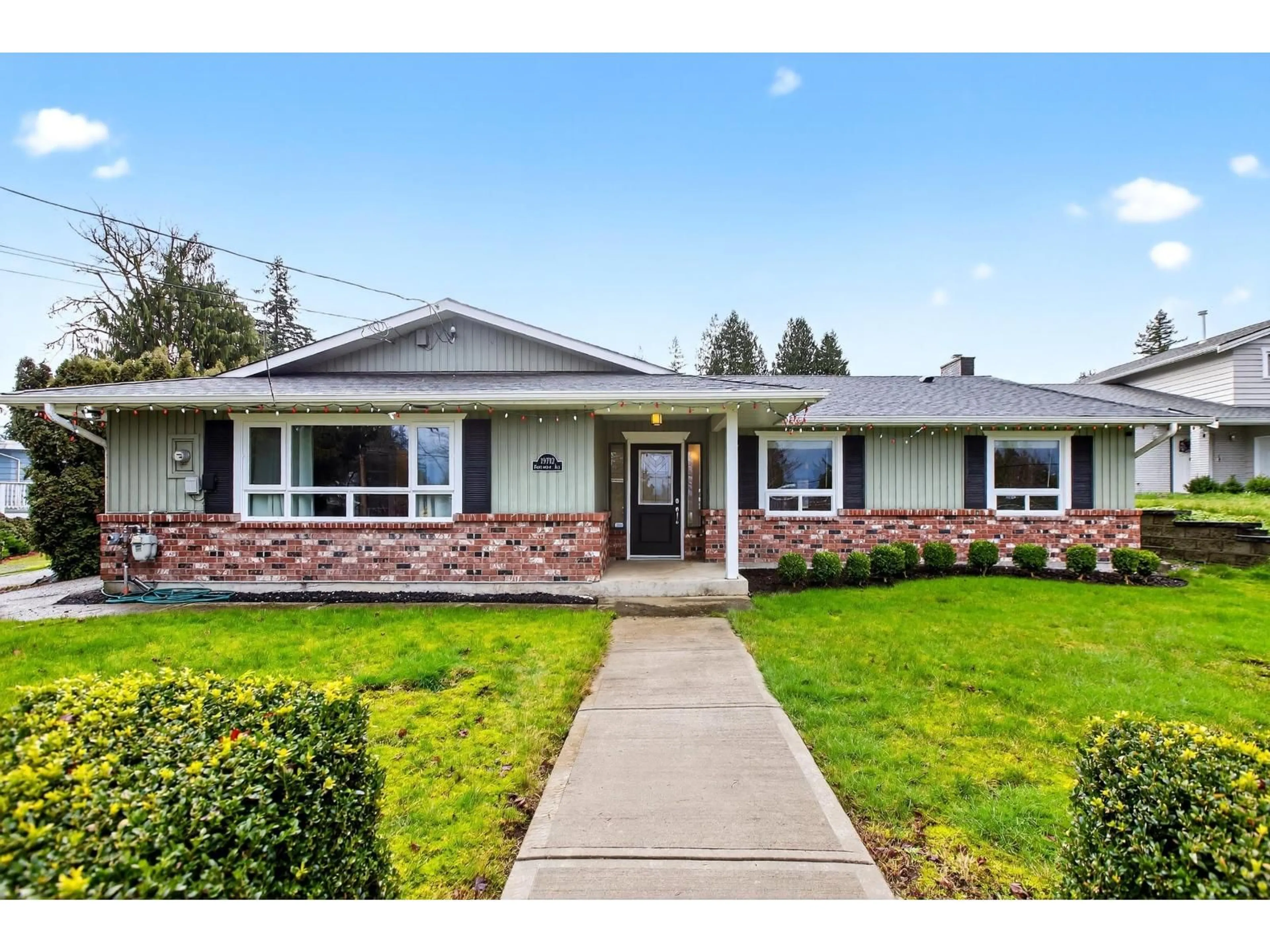 Home with vinyl exterior material, street for 19712 49TH AVENUE, Langley British Columbia V3A3R3