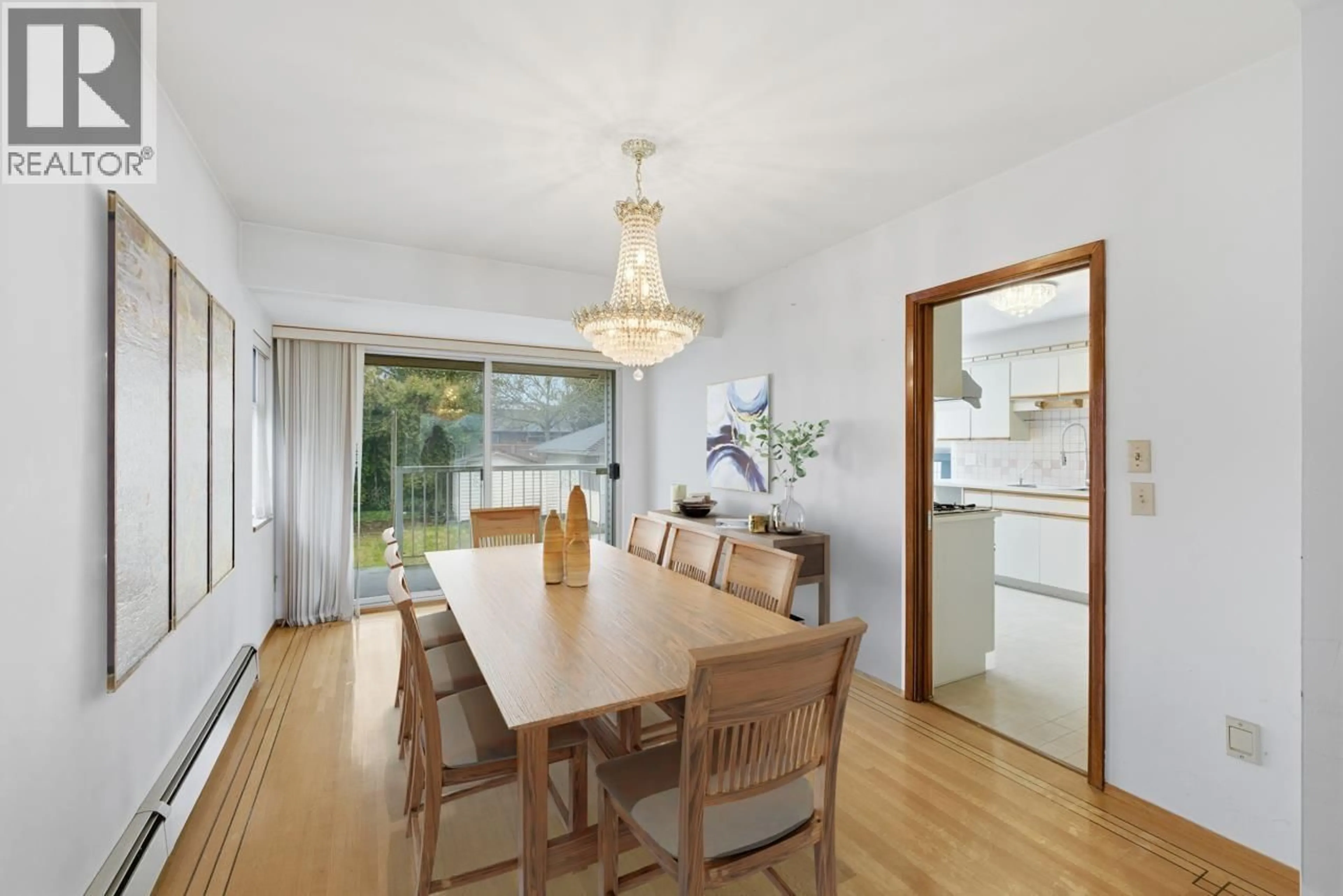 Dining room, wood/laminate floor for 6709 ASH STREET, Vancouver British Columbia V6P3K3