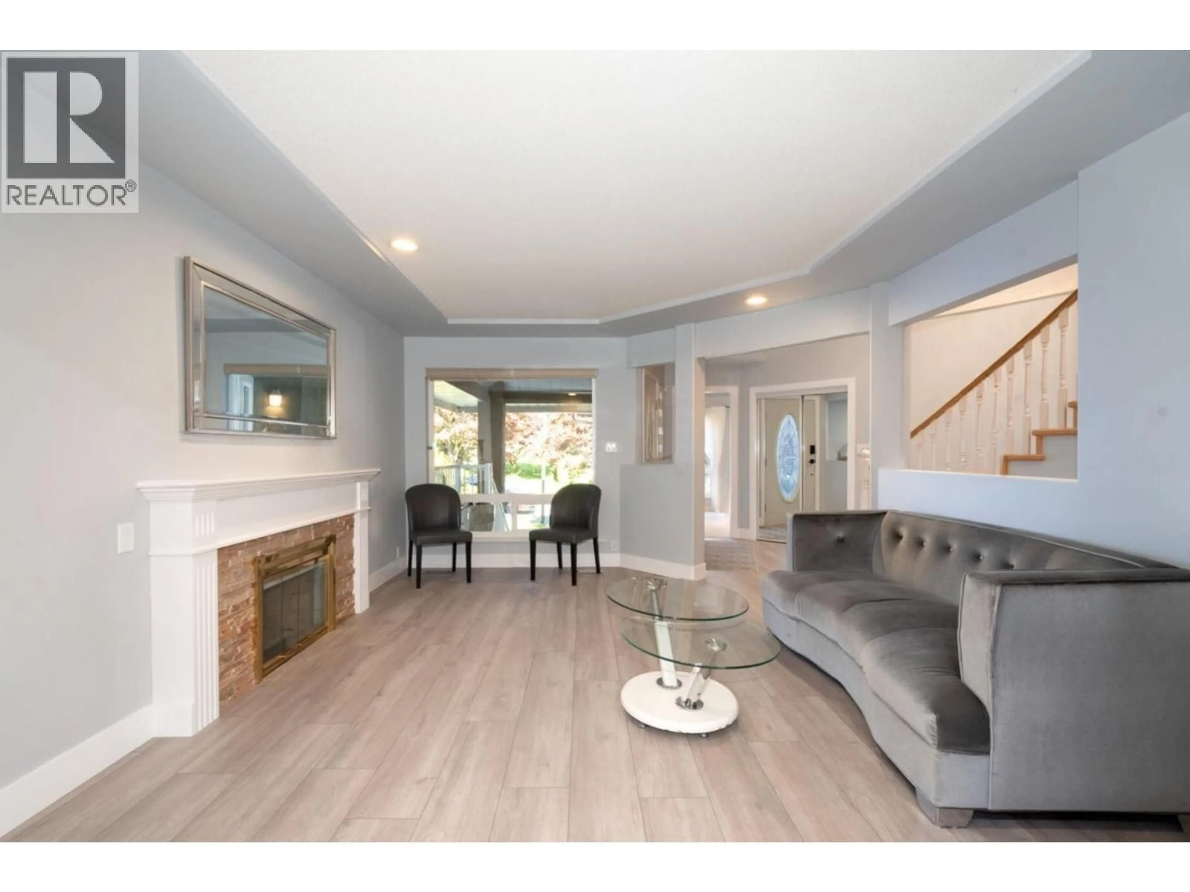 Living room with furniture, wood/laminate floor for 1416 PURCELL DRIVE, Coquitlam British Columbia V3E2R7