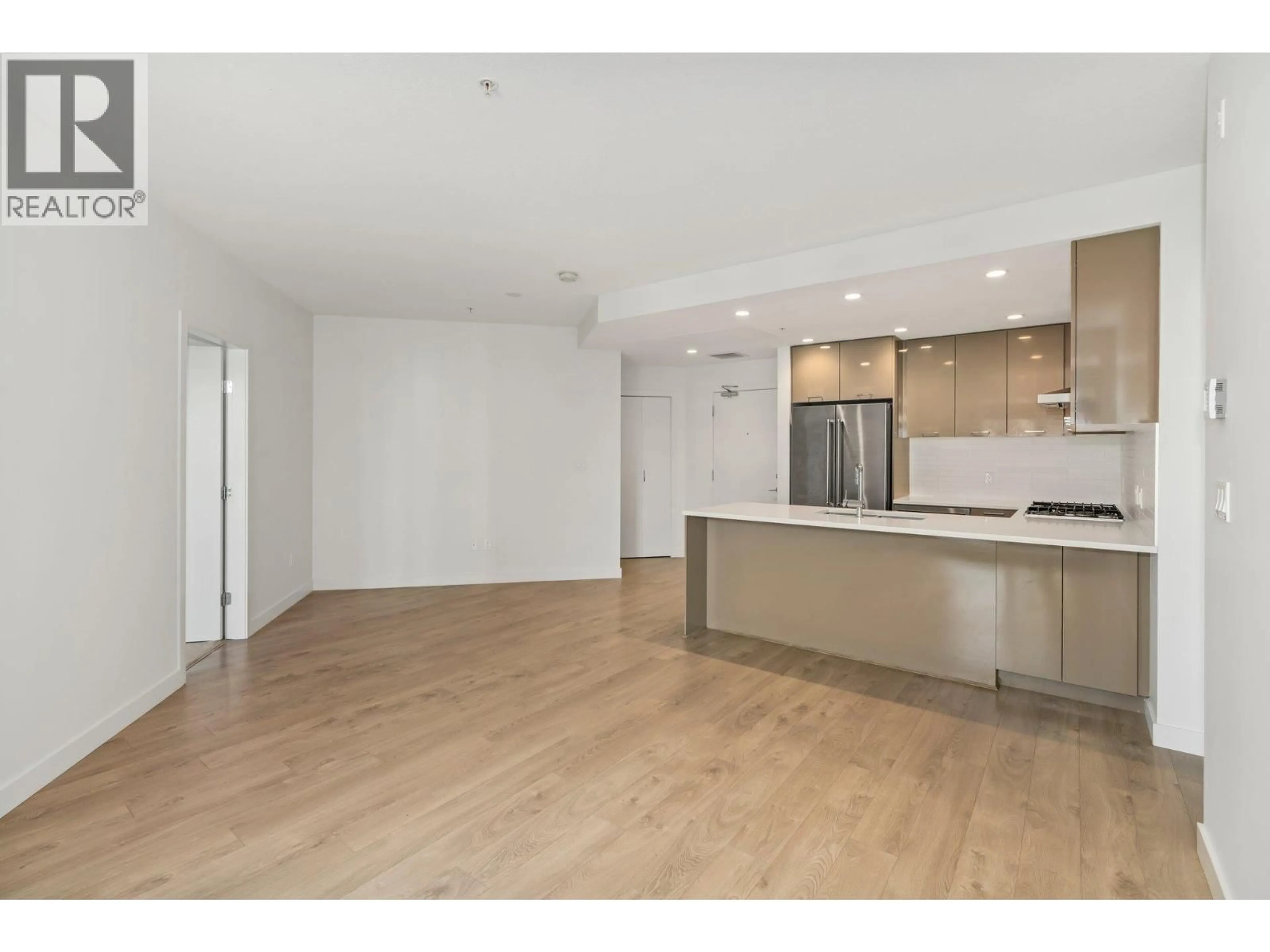 Open concept kitchen, wood/laminate floor for #410 - 3581 ROSS DRIVE, Vancouver British Columbia V6S0K5
