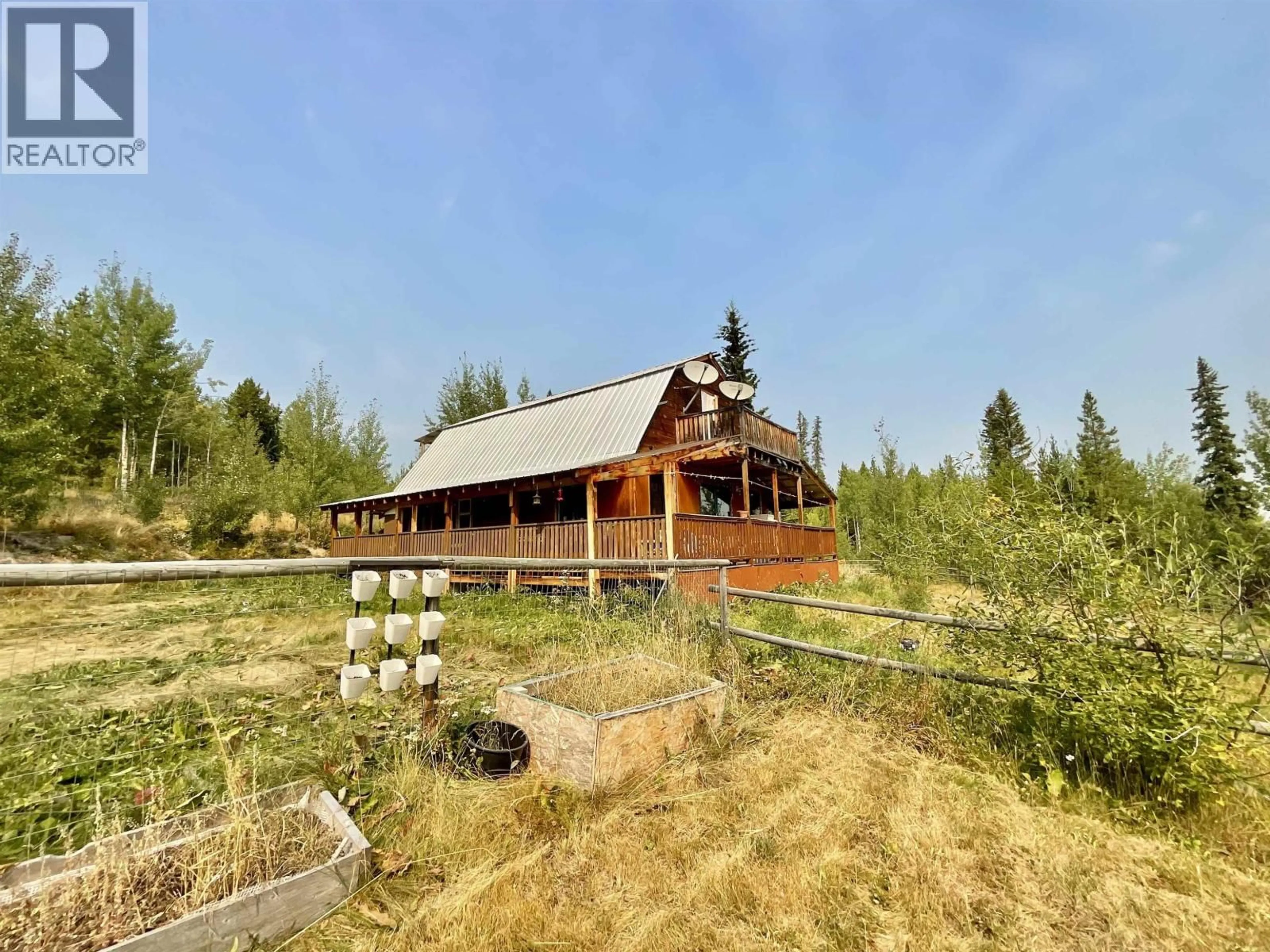A pic from outside/outdoor area/front of a property/back of a property/a pic from drone, unknown for 2100 TIBBLES ROAD, Quesnel British Columbia V2J3H9