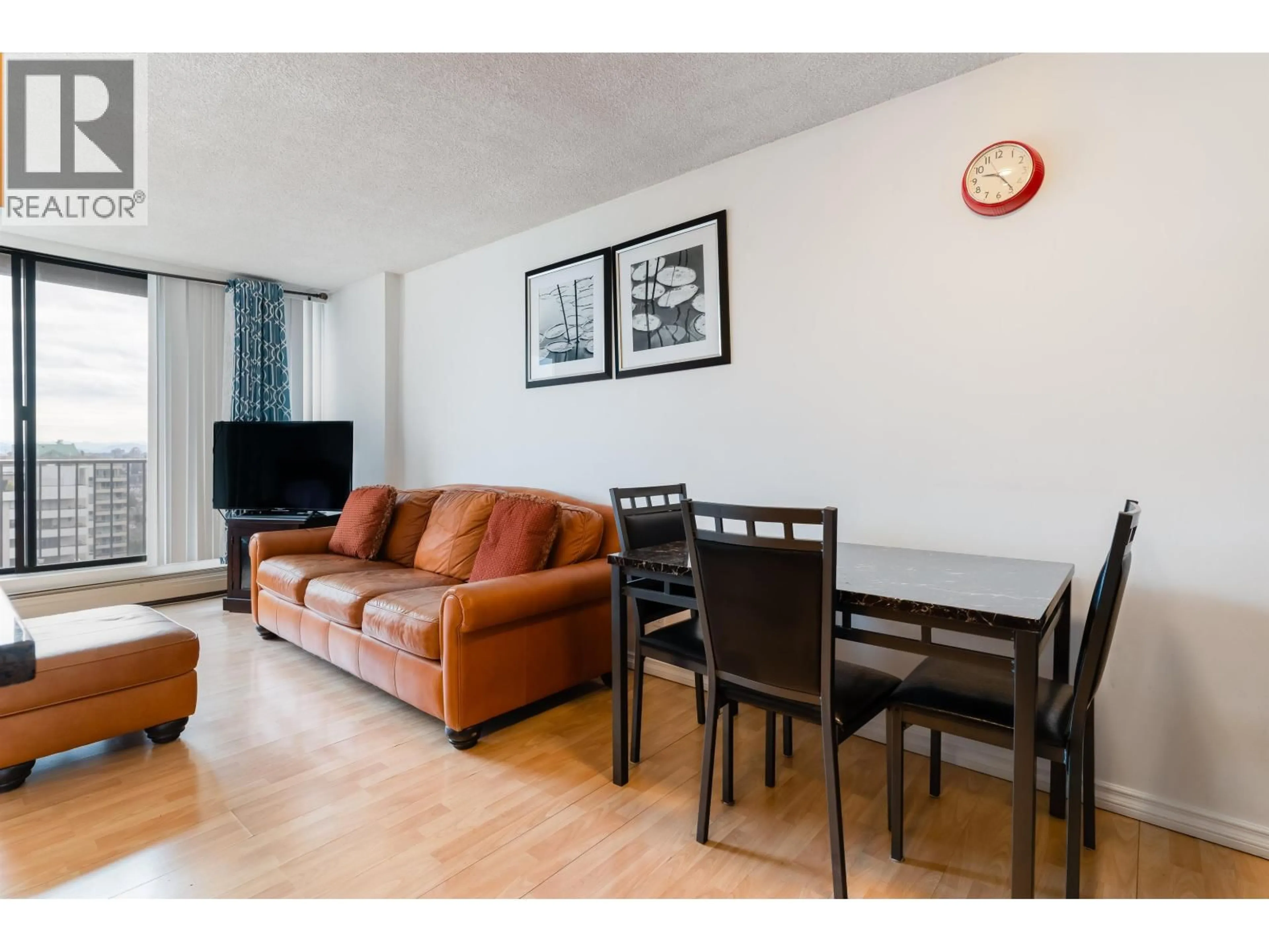Living room with furniture, wood/laminate floor for 1402 - 7275 SALISBURY AVENUE, Burnaby British Columbia V5E4E1