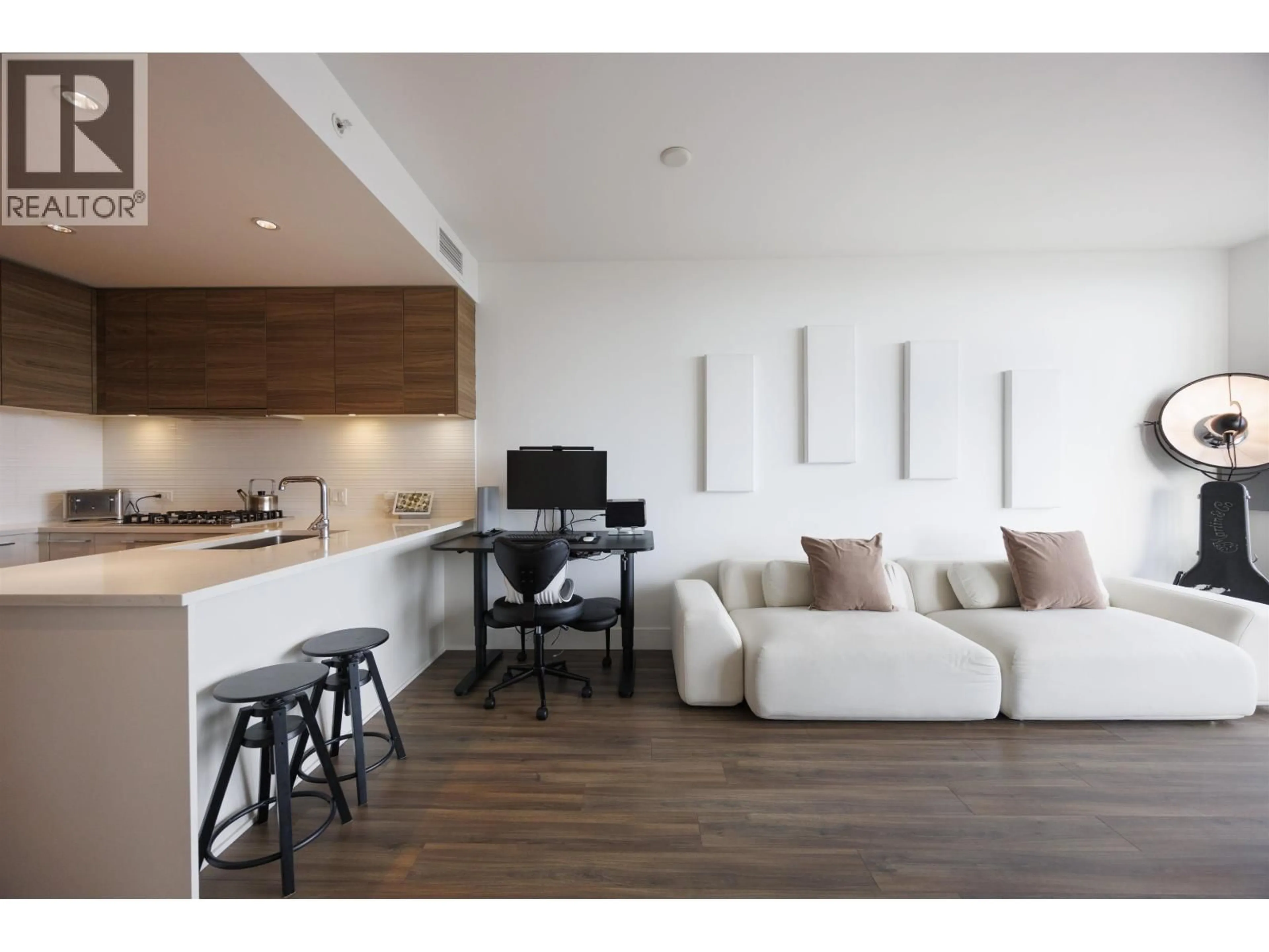 Living room with furniture, wood/laminate floor for 2506 - 7303 NOBLE LANE, Burnaby British Columbia V3N0H2