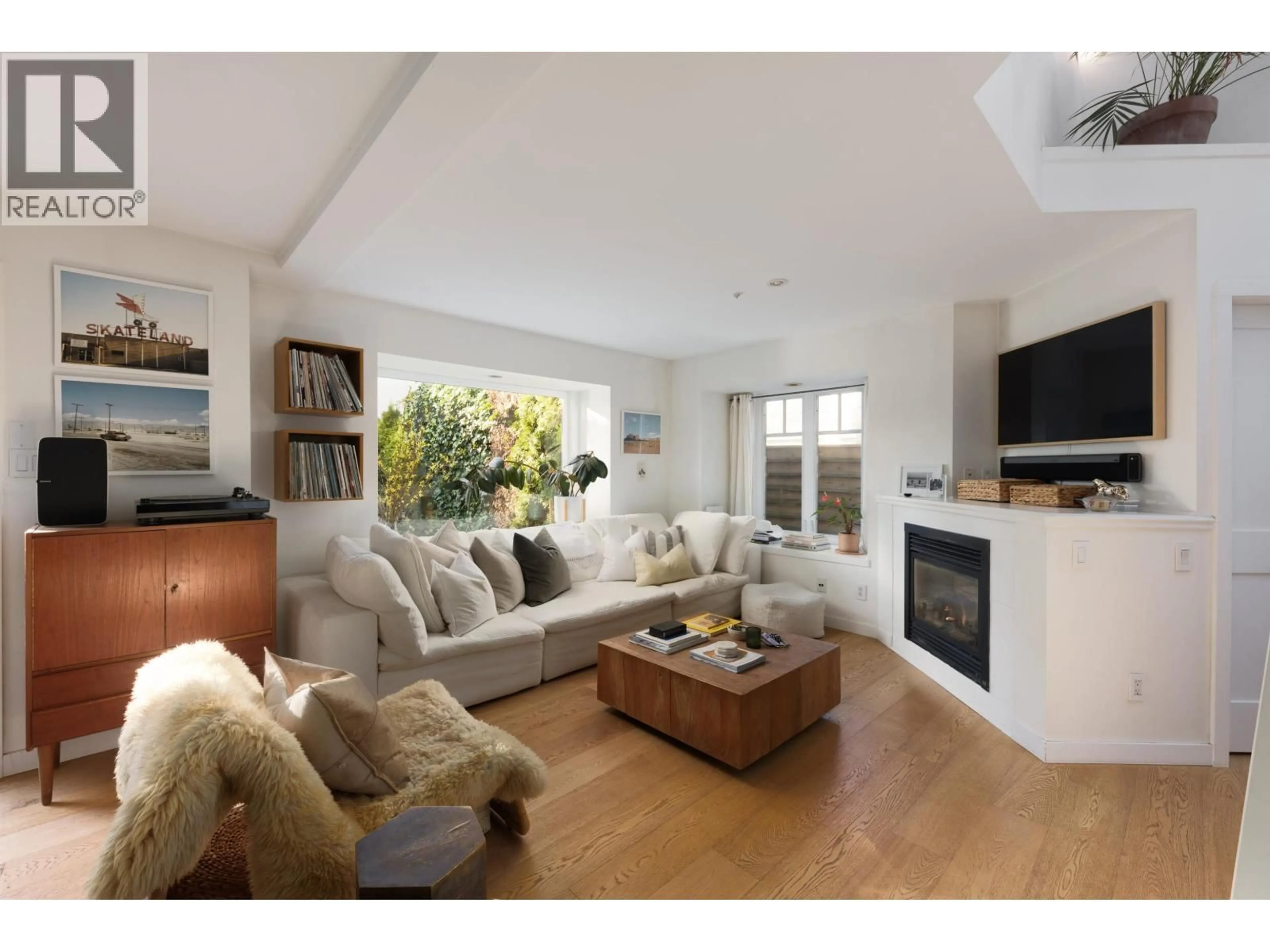 Living room with furniture, wood/laminate floor for 3260 8TH AVENUE, Vancouver British Columbia V6K2C5