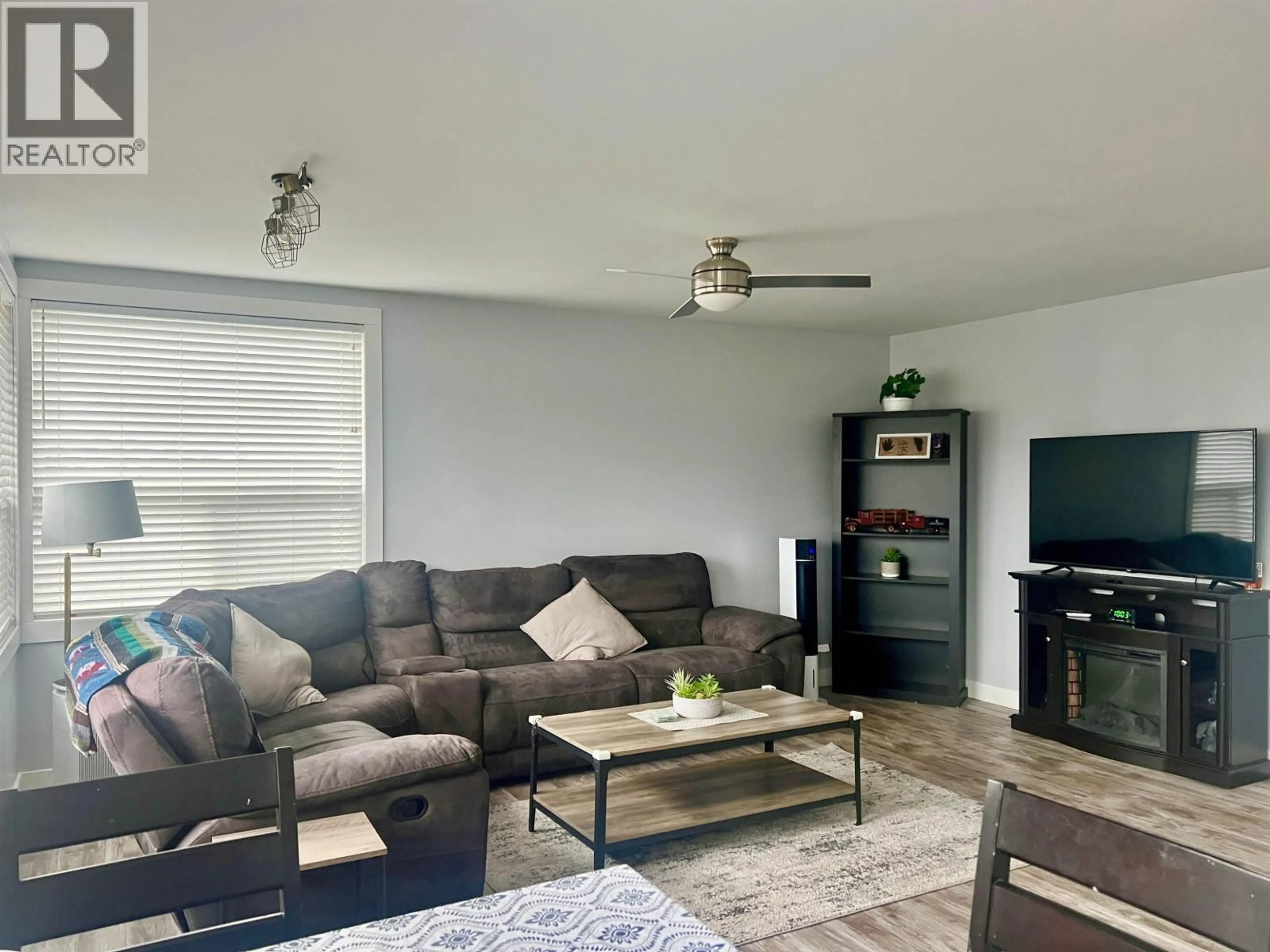 Living room with furniture, wood/laminate floor for 107 RALEY STREET, Kitimat British Columbia V8C1G9