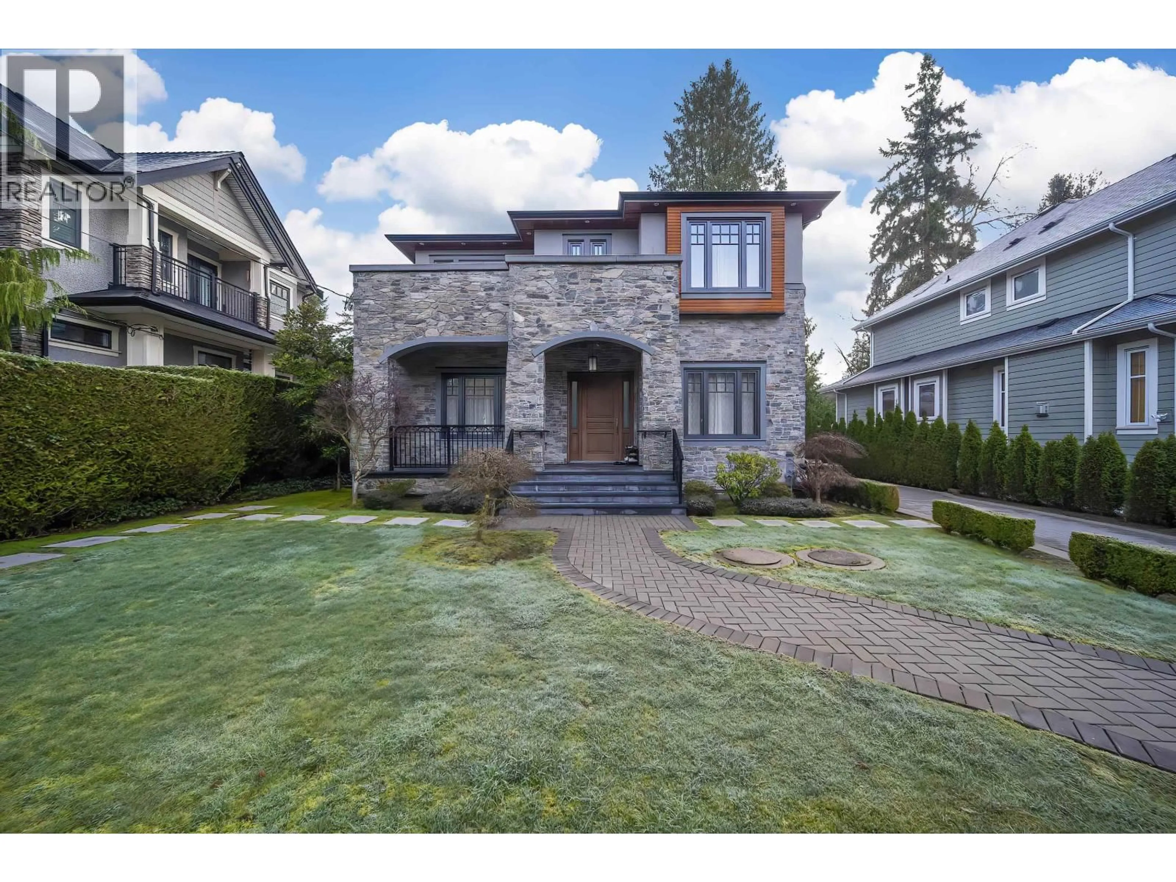 Home with brick exterior material, street for 6338 ELM STREET, Vancouver British Columbia V5R3K9