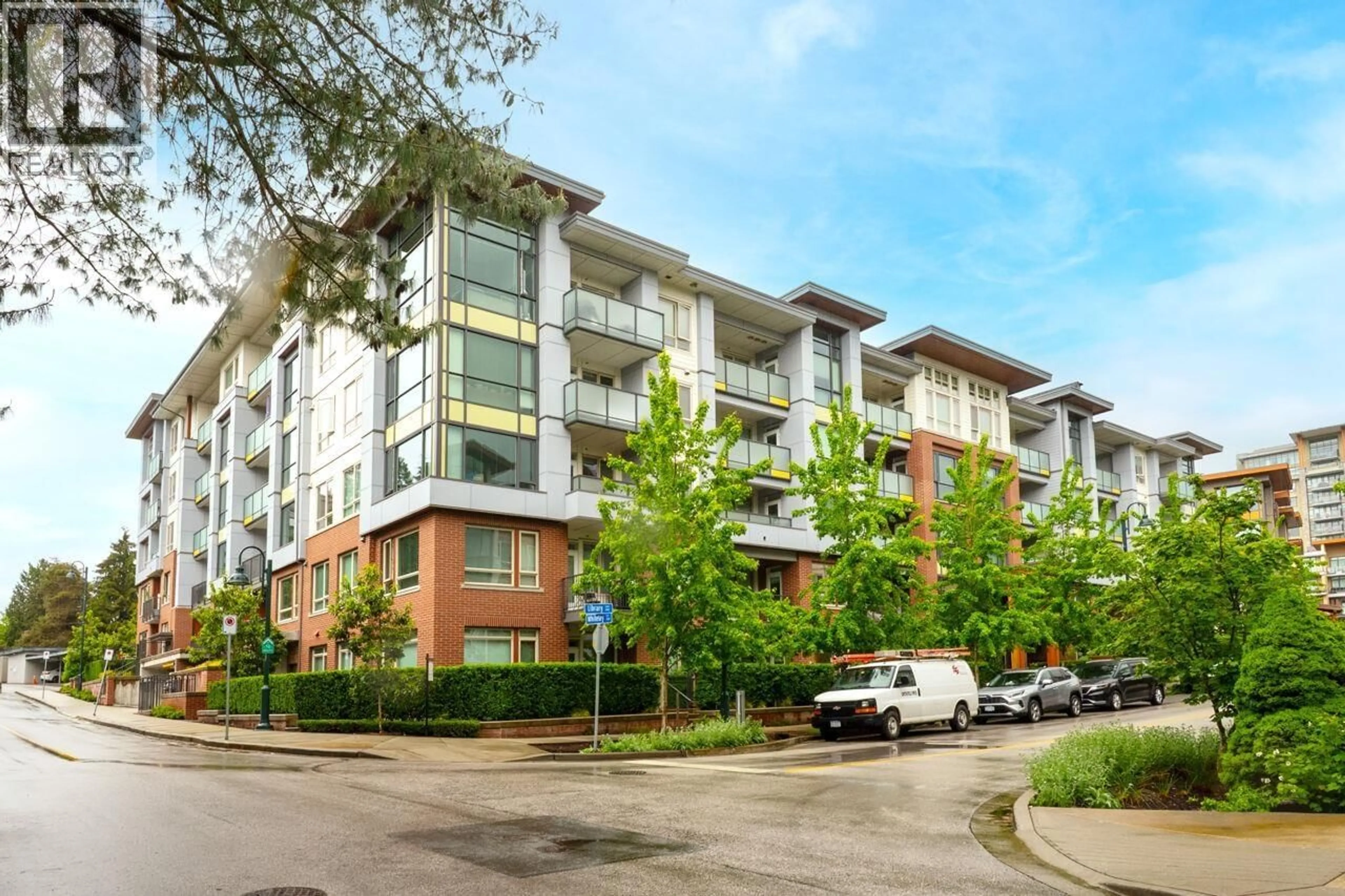 A pic from outside/outdoor area/front of a property/back of a property/a pic from drone, street for 214 - 2651 LIBRARY LANE, North Vancouver British Columbia V7J0C1