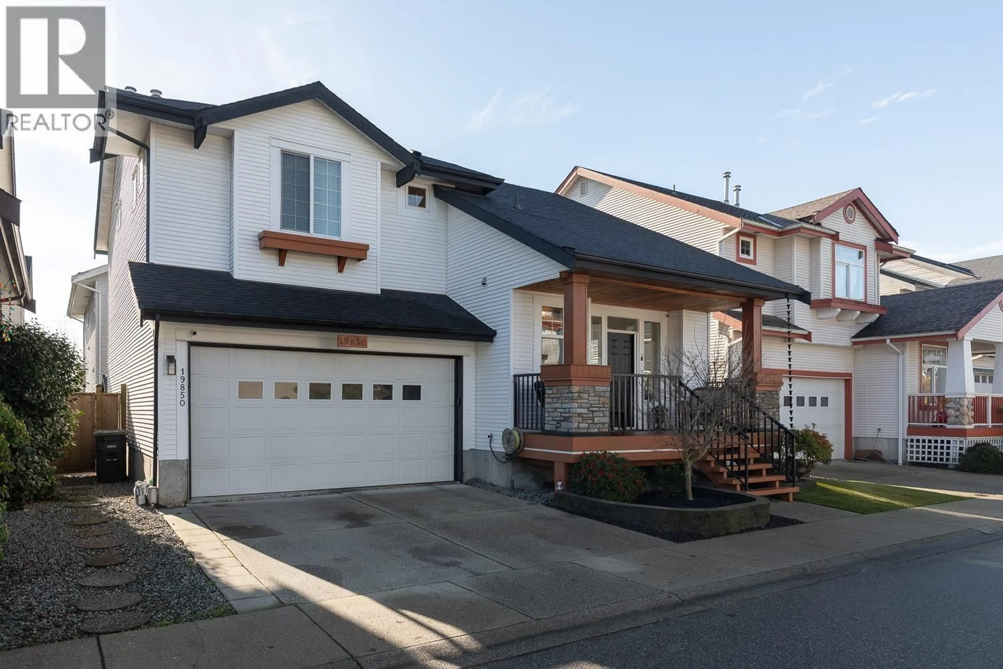 Home with vinyl exterior material, street for 19850 BUTTERNUT LANE, Pitt Meadows British Columbia V3Y2S7